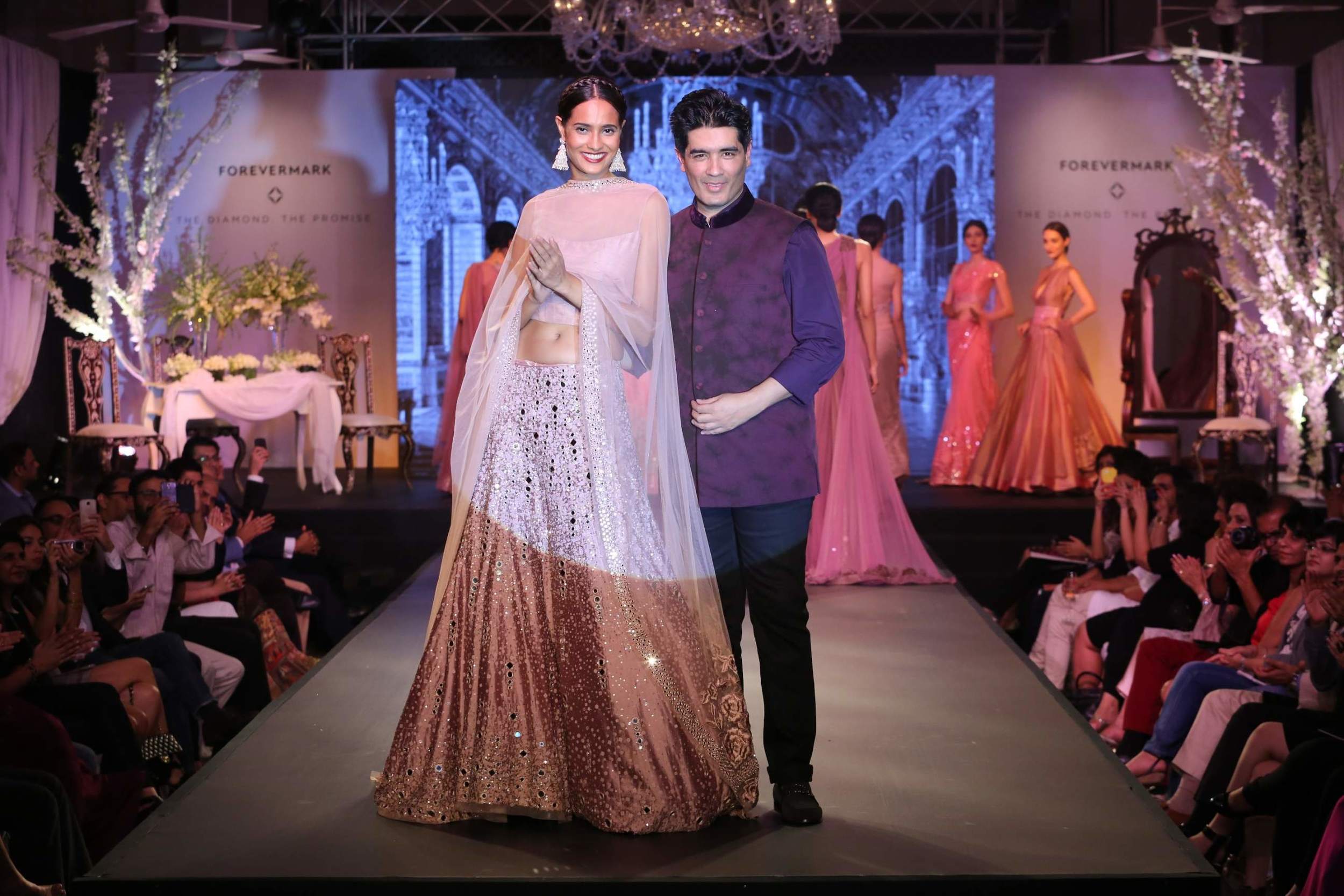 Rikki Chatterjee wearing the Forevermark Promise earrings desgined by Manish Malhotra
