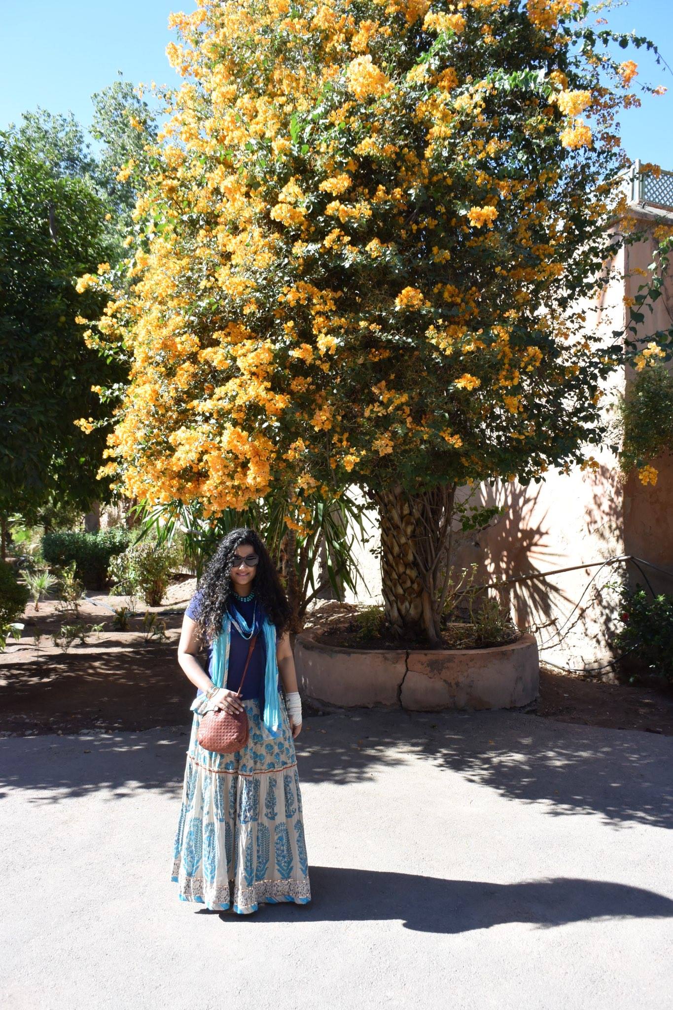 Skirt & Stole: Label by Ritu Kumar, T-shirt: Ralph Lauren, Sling: Bottega Veneta, Bangles: Hermes, Neckpiece: Amrapali, Sunglasses: Dior