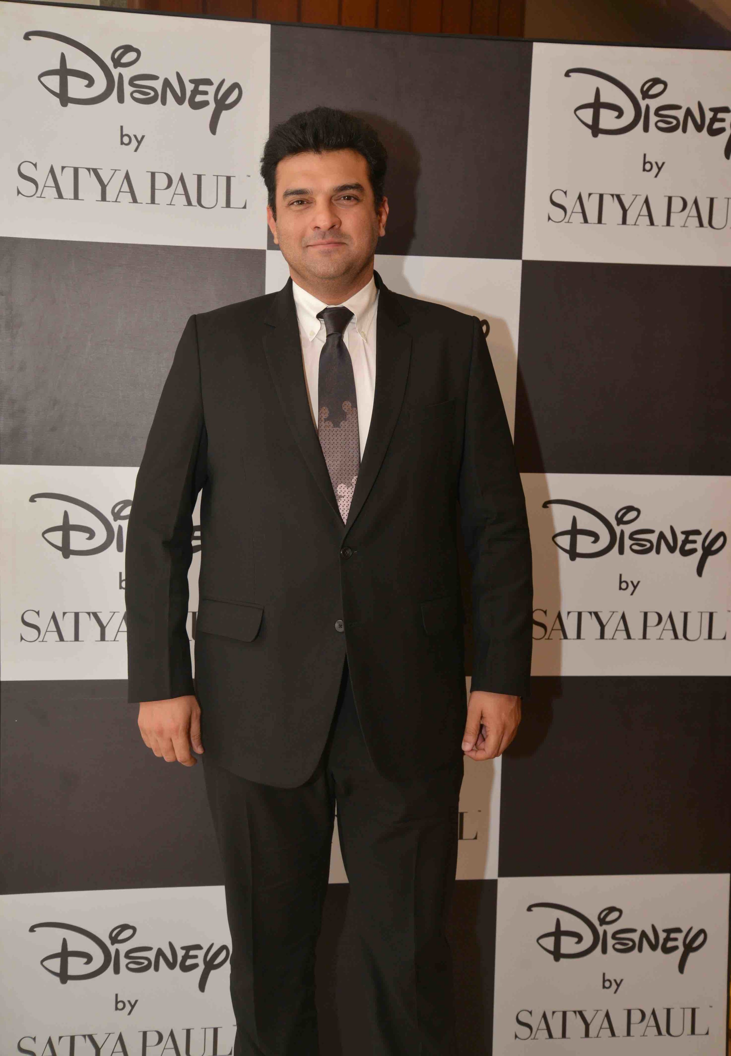 Siddharth Roy Kapur in a Disney Monopop By Satya Paul Tie