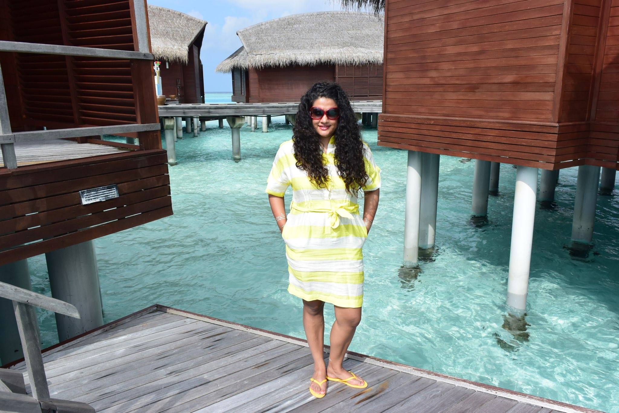 Dress & Flip-flops from Burberry, Sunglasses Tom Ford