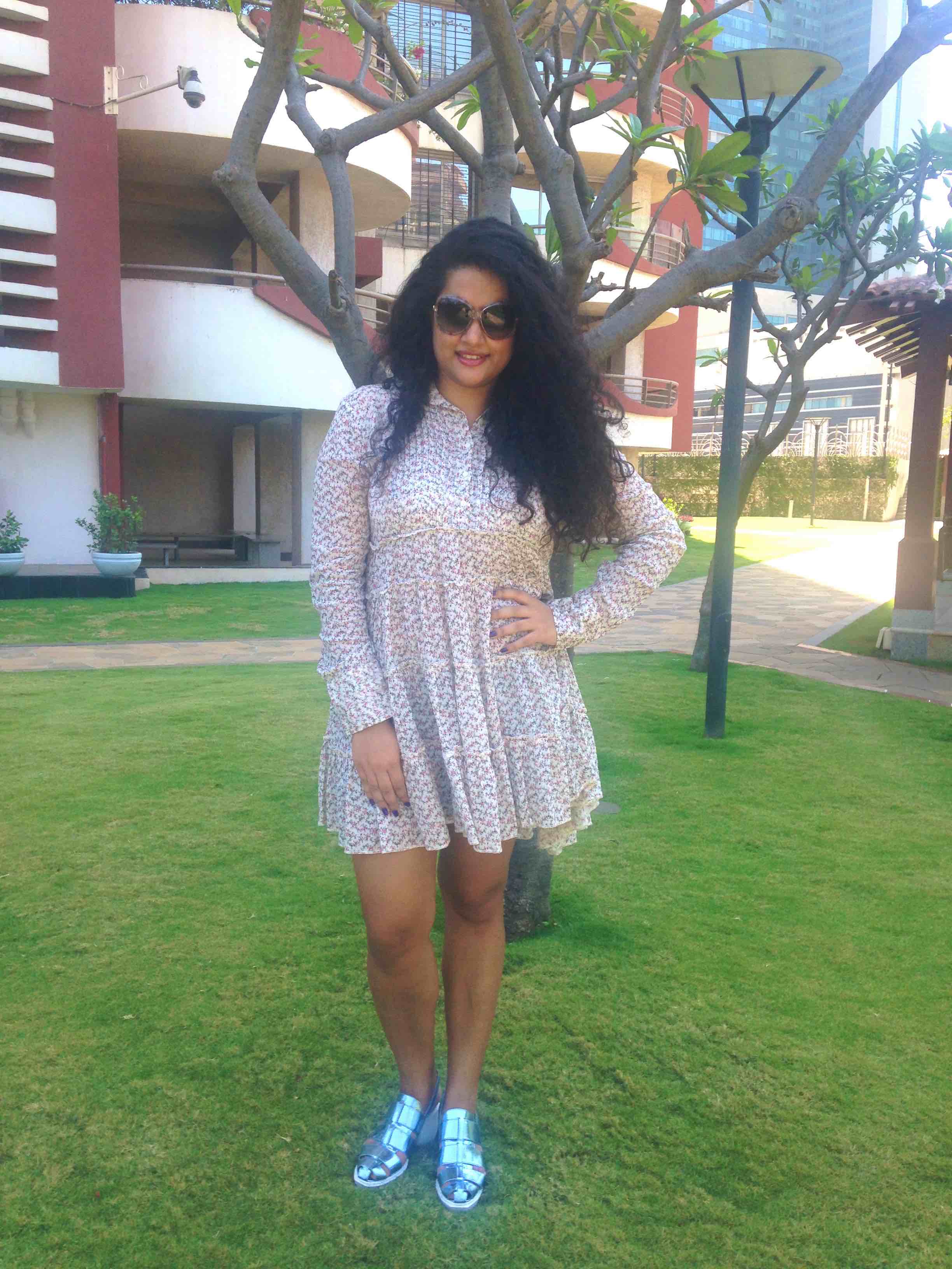 Sandals: Opening Ceremony, Tunic: Ralph Lauren, Sunglasses: Gucci, Shorts: Alice + Olivia