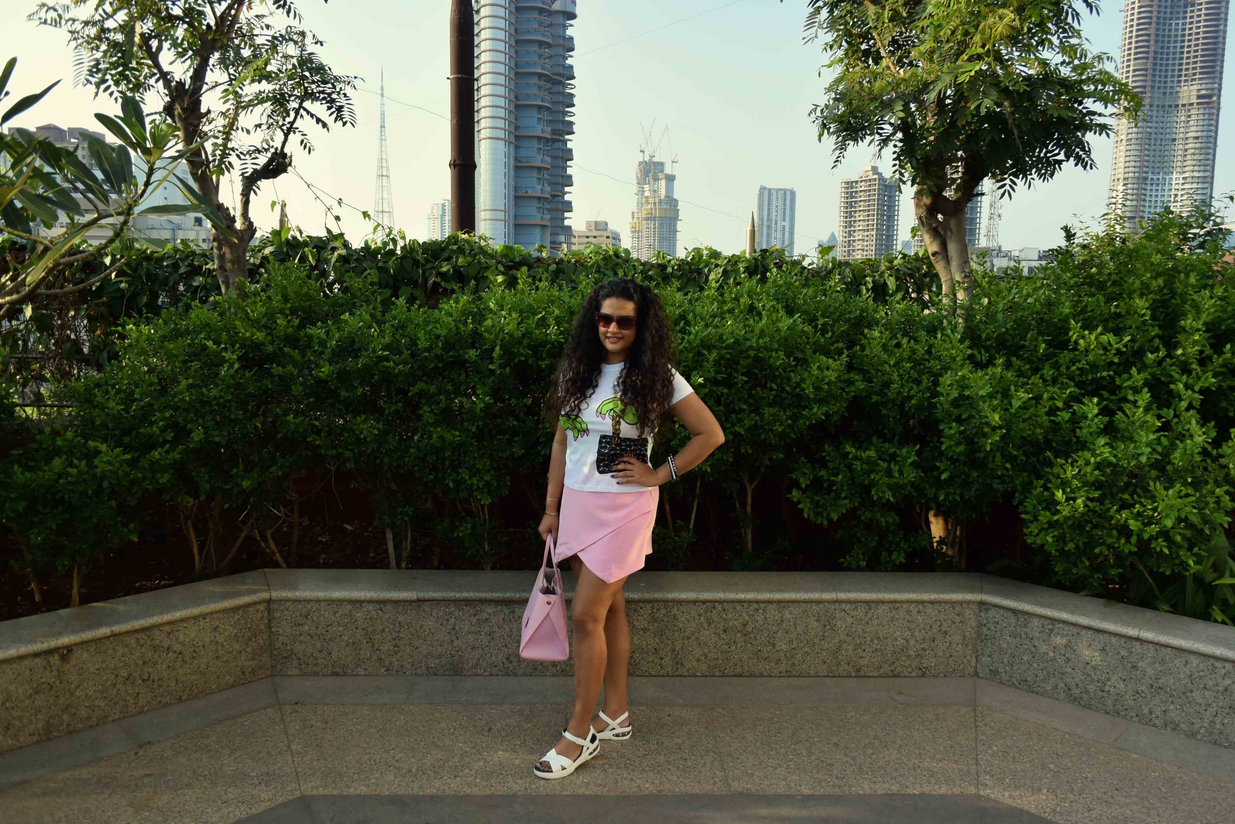 Skort - Asos, T-Shirt - Moschino, Bag - Dior, Sunglasses - Prada, Bangles - Furla, Sandals - Marc by Marc Jacobs 