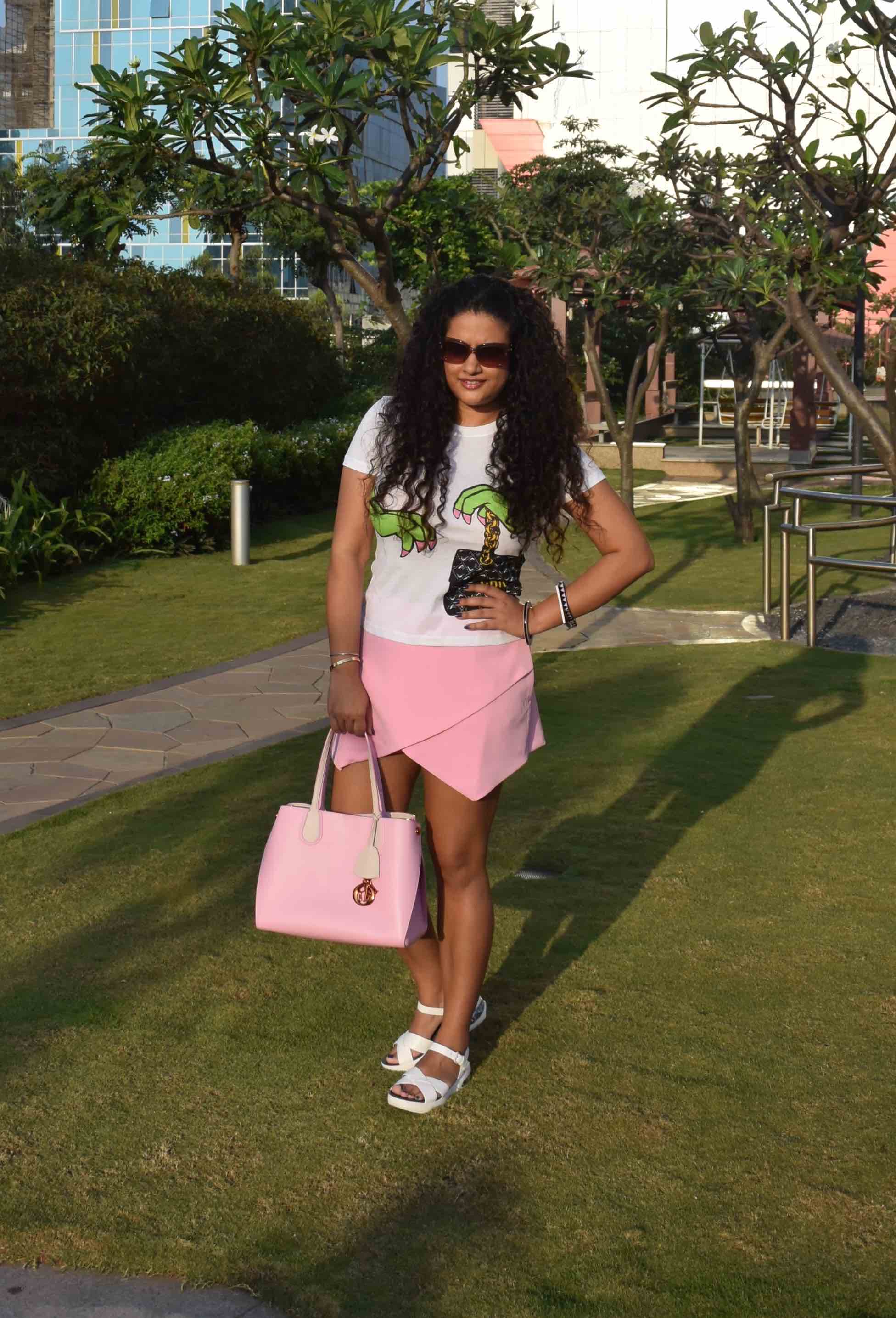 Skort - Asos, T-Shirt - Moschino, Bag - Dior, Sunglasses - Prada, Bangles - Furla, Sandals - Marc by Marc Jacobs 