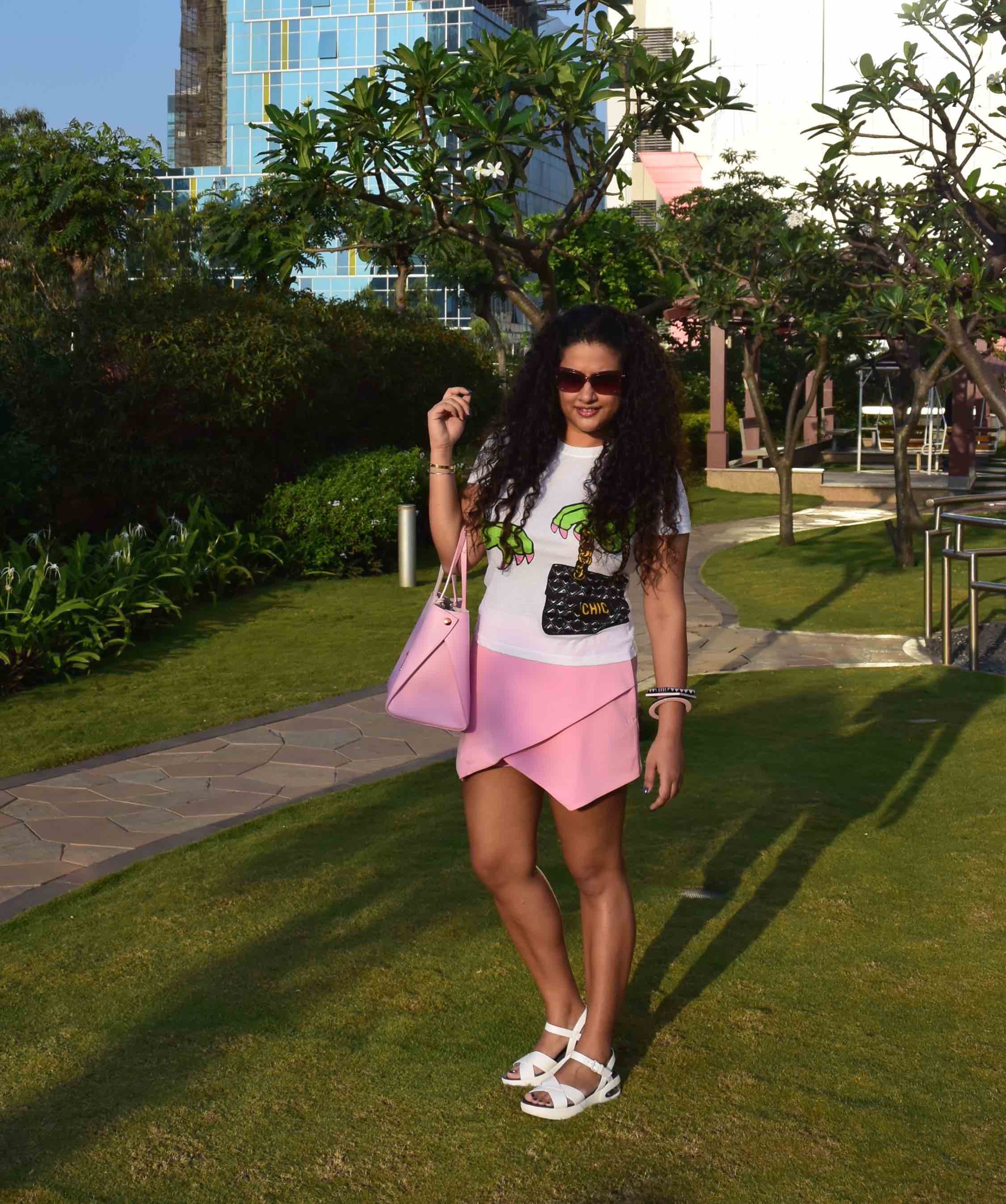 Skort - Asos, T-Shirt - Moschino, Bag - Dior, Sunglasses - Prada, Bangles - Furla, Sandals - Marc by Marc Jacobs 