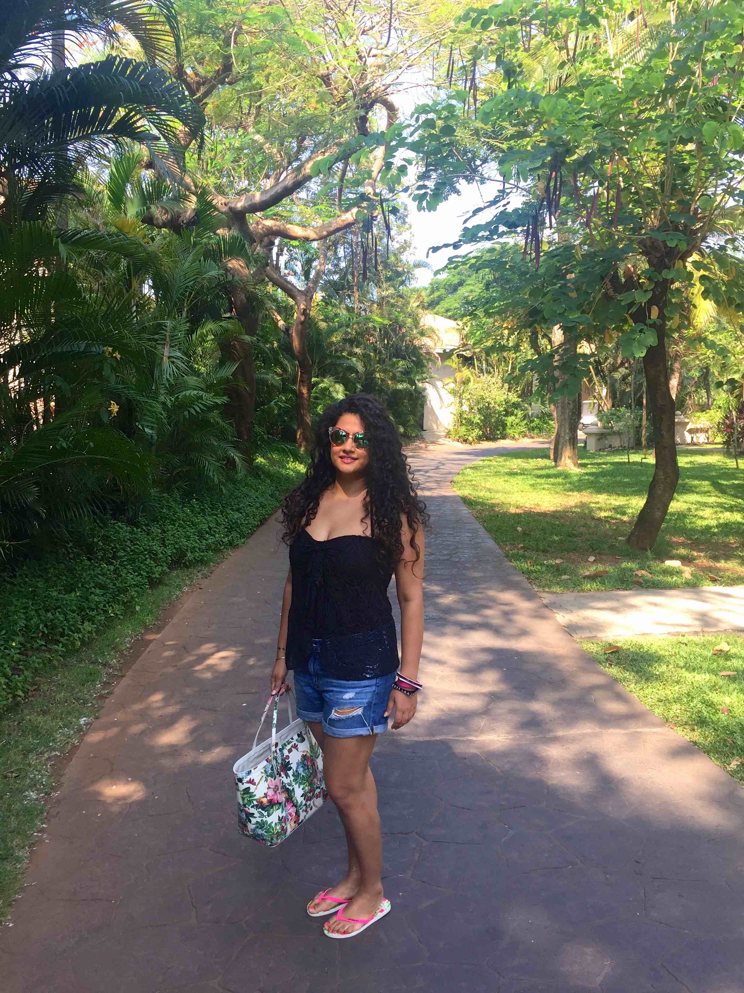 Bathing Suit: Ralph Lauren, Shorts: Adriano Goldschmied, Tote: Dolce & Gabbana, Flip-flips: Havaianas, Bangles: Furla, Sunglasses: Gucci