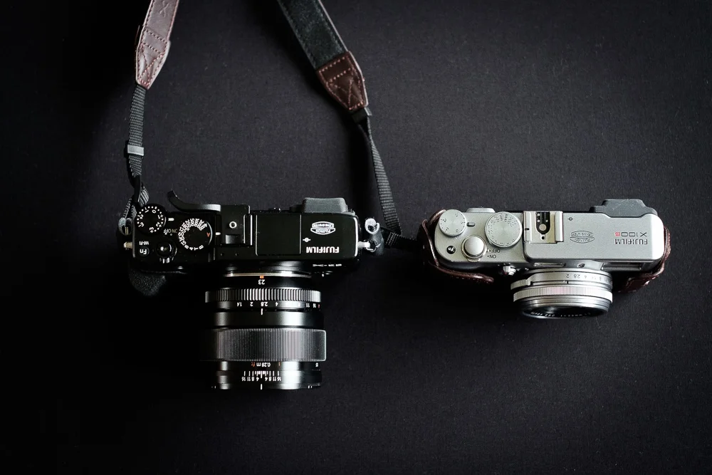 My XE2 with the 23mm mounted next to my X100s.The XE2 body is comparable to the X100s, but when the 23mm F1.4 is mounted the difference is substantial. 