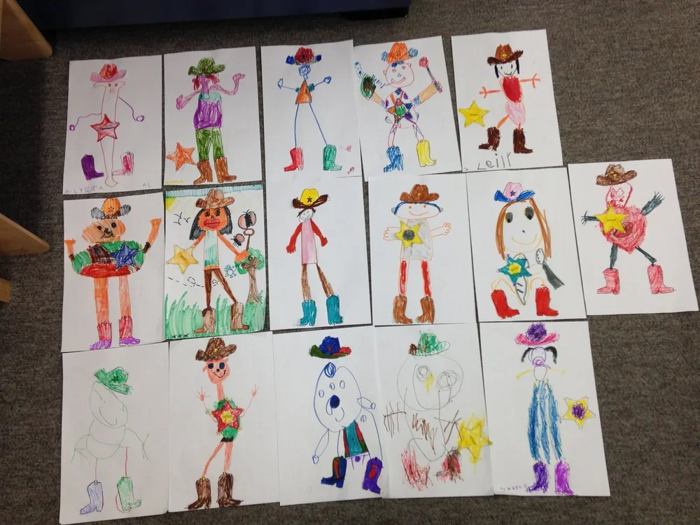 Children's drawings of cowboys, cowgirls, and a cow, with various colorful outfits, hats, and star decorations.