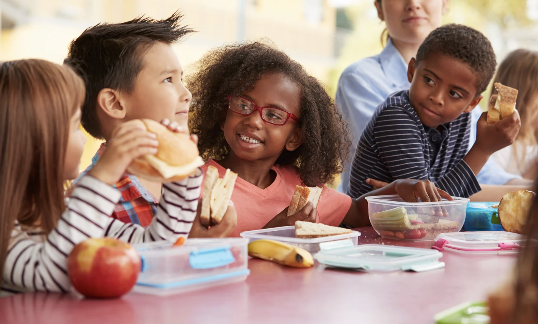 children eating lunch promotion for Full Day Care program in Brentwood NW Calgary