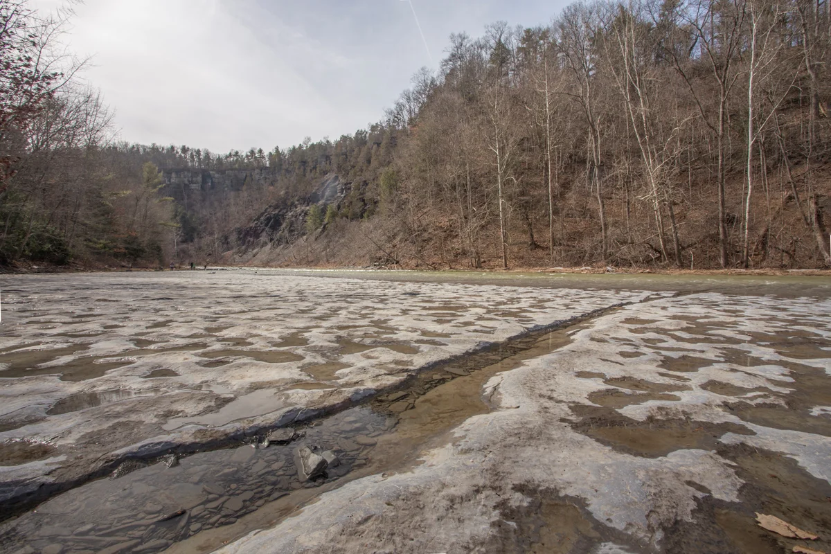 The rock flats that line the river and bends all the way up to the falls.