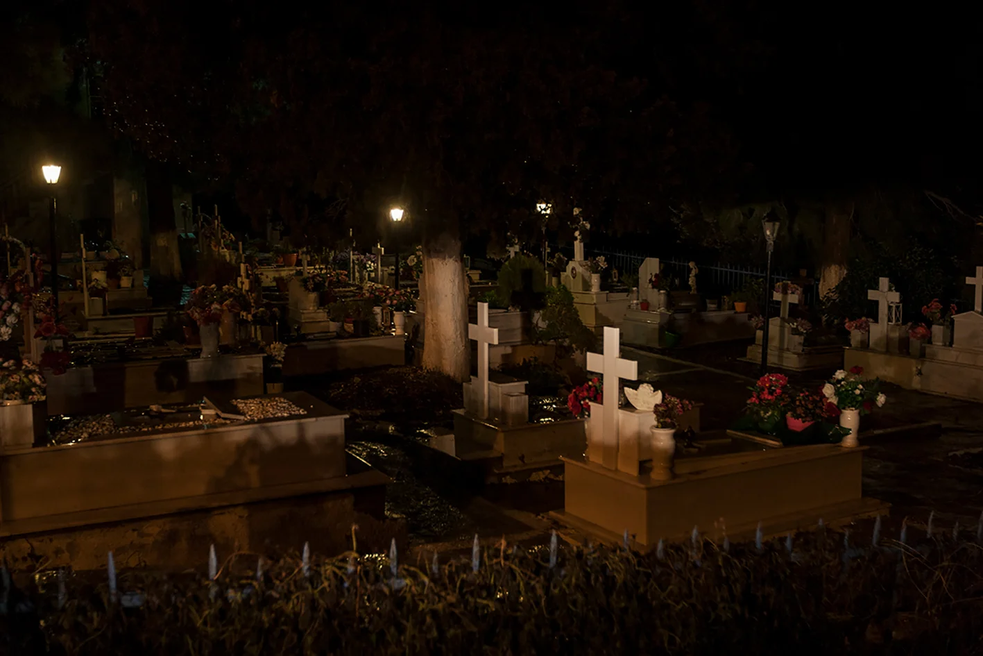 WORK IN PROGRESS Lesbos - 2017 Near the road on the 6 kilometers between Moria and Mytilene, there's a cemetery for locals. The Christian graves are richly adorned. A few kilometers further, a small plot of land is used as a cemetery for drowned Syrians, mostly anonymous. Read more