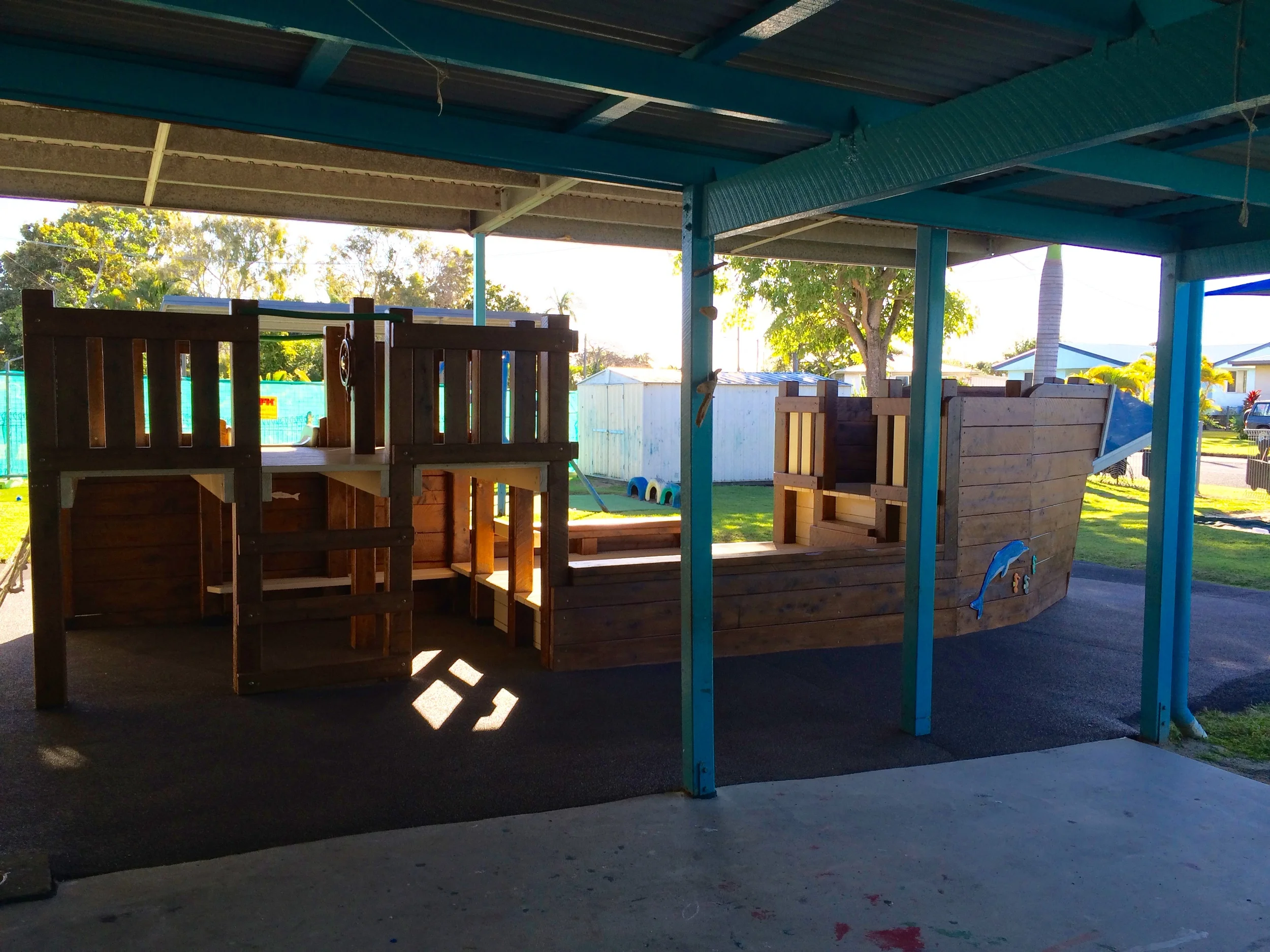 From Possum Pods to Pirates, While Brisbane was freezing we were in Mackay at a Barilla Child Care Centre building a Pirate Ship. It had to have a Walk the plank, a Ships bell and a Slide, well why not. Dolphins at the bow and a ships whee