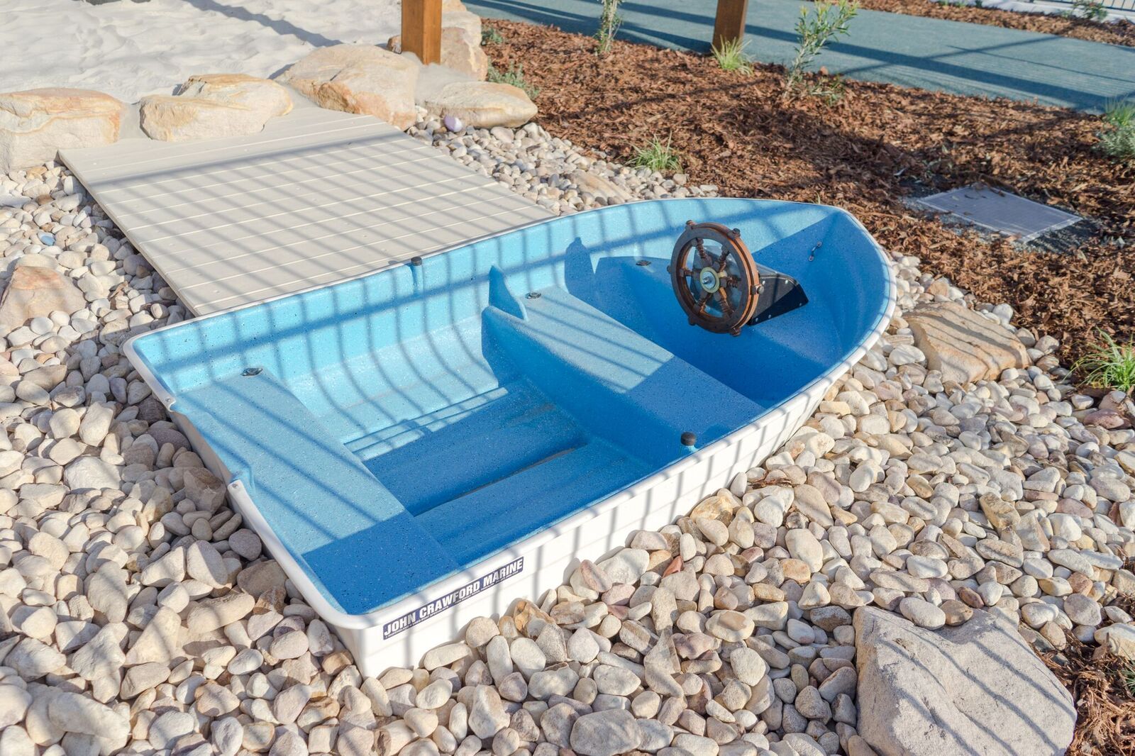 The dry creek bed has a jetty to connect the boat to the sand-pit.