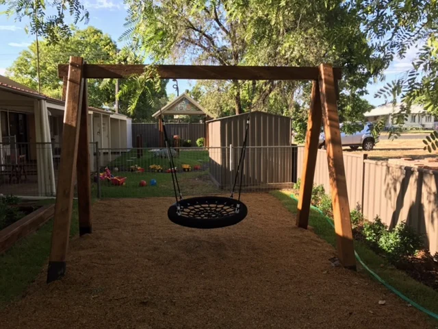After, with planting, a raised painter box and the Kindy girls changed out the old painted mural fence, an instant up date. Looks good girls.