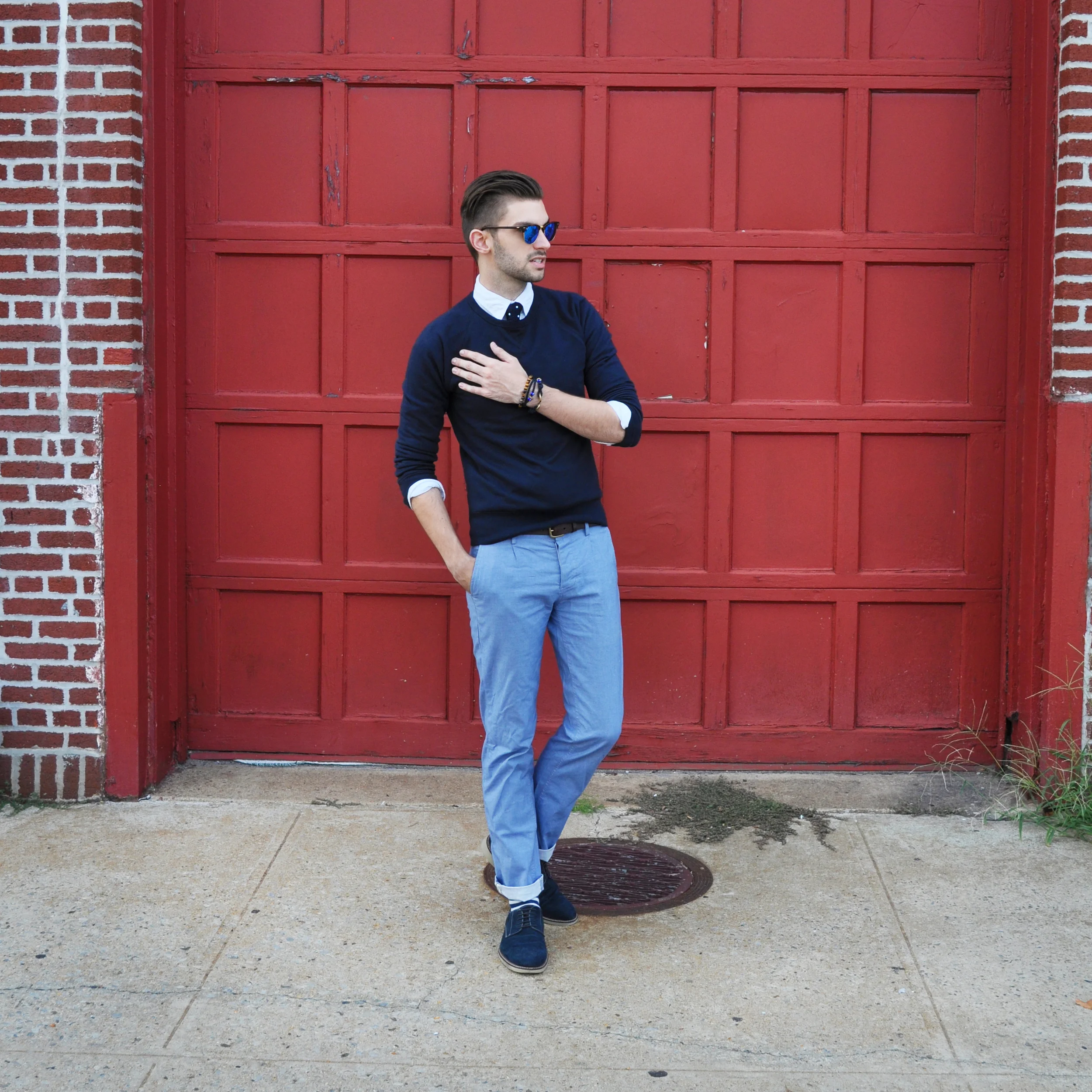 I have started to think of my personal style as "elevated activewear", somewhere in between street style and dapper duds. I love sweatshirts, tees and denim, but usually find a way to polish them up a bit. I'm a visual merchandiser so I live a pretty physically active life. Always on the go and ready to build, climb, paint or style. I'd love to wear a blazer everyday but it just isn't practical. Sweatshirts over shirts keep me cool and polished yet ready for whatever life is ready to throw my way. There's something so striking about wearing one color head to toe. A subtle art is required when combining different hues so you don't look like a children's TV character but if you get it just right, you'll turn heads in all the right ways. It requires savvy styling. I'm all about Indigo and chambray so blue was an obvious option. The white shirt makes the look crisp and the tie ads just the right amount of pattern. Just pick a color and run with it! How would you describe your personal style? Dapper or Street? Rugged or polished? Club Monaco sweatshirt / J-Crew shirt / Ben Sherman chambray trousers ( similar ) / The Tie Bar tie / Ray-Ban sunglasses / J-crew socks / Banana Republic shoes / Giles & Brother s-hook bracelet