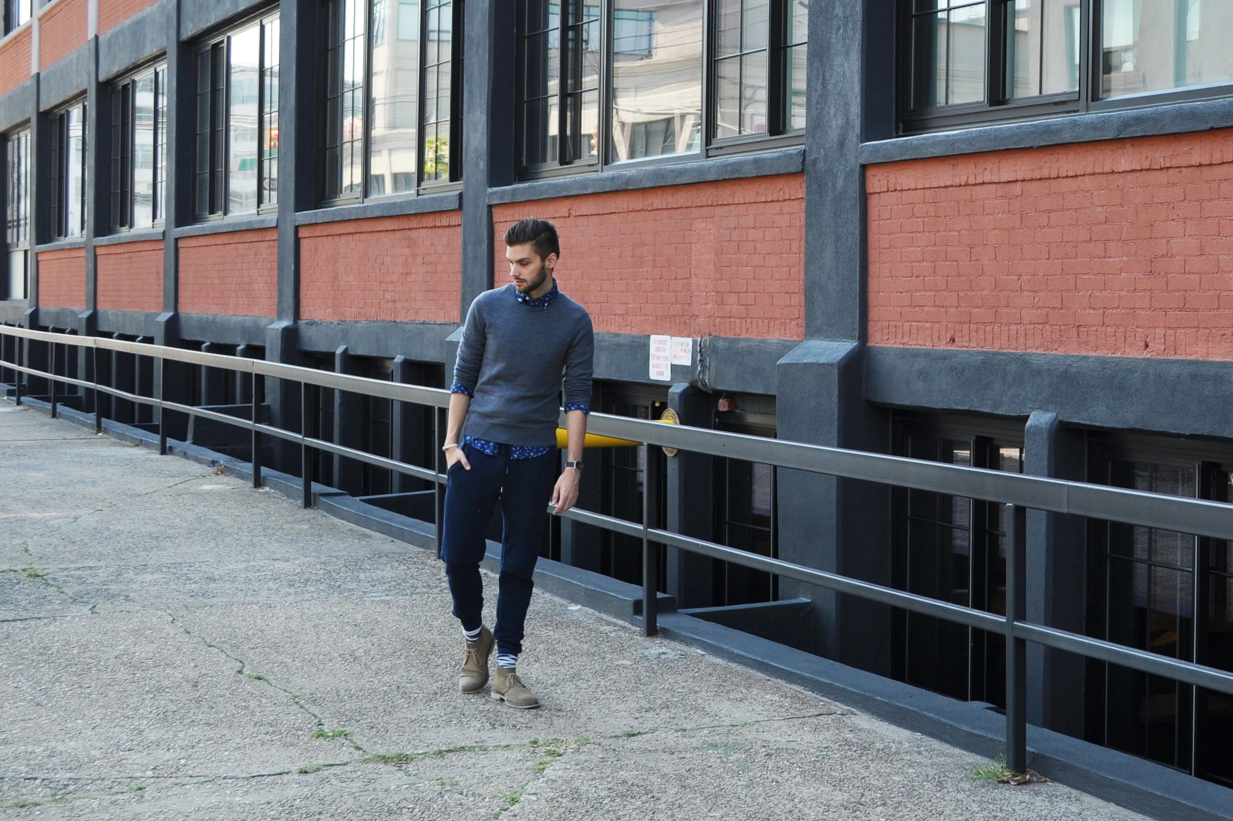 I told you I love elevated activewear! Todd Snyder is my spirit animal . In honor of my love, here are some tips to avoid looking like you're heading to the gym while wearing sweats: The key is in mixing highs and lows . These joggers are a low while the floral shirt is a high. (A low is something casual/knit/cozy while a high is something refined/polished/elevated) It's a mash up that's smart. Take your joggers and grab a coffee on a Sat morning, or go for a day out in the city. It's relaxed but polished enough for wherever you end up. Throw on a blazer and you're set for a couple of late night drinks. Just make sure your joggers are cut slim and lack any sort of giant logo on the side.... It's time to think differently about your sweatpants! ;) We shot this look in front of a brand new hotel by our apt called The Paper Factory. It's exactly what the name says: a converted paper factory. There's just something about converted industrial spaces that are so interesting. I stayed at a stunning hotel in Midtown called the Refinery that was once a hat factory. Desks that looked like sewing machines, drawings of hats on the walls, tile mosaics of millinery tools... It was like a themed Restoration Hardware (another love of mine). Our families are coming for Thanksgiving and we already booked rooms at The Paper Factory. Looking forward to a peek inside!! Banana Republic knit pant / Club Monaco merino sweater and floral shirt ( similar ) / J-Crew socks / Banana Republic boots / Maritime Supply Co. buoy bracelet / Nixon watch