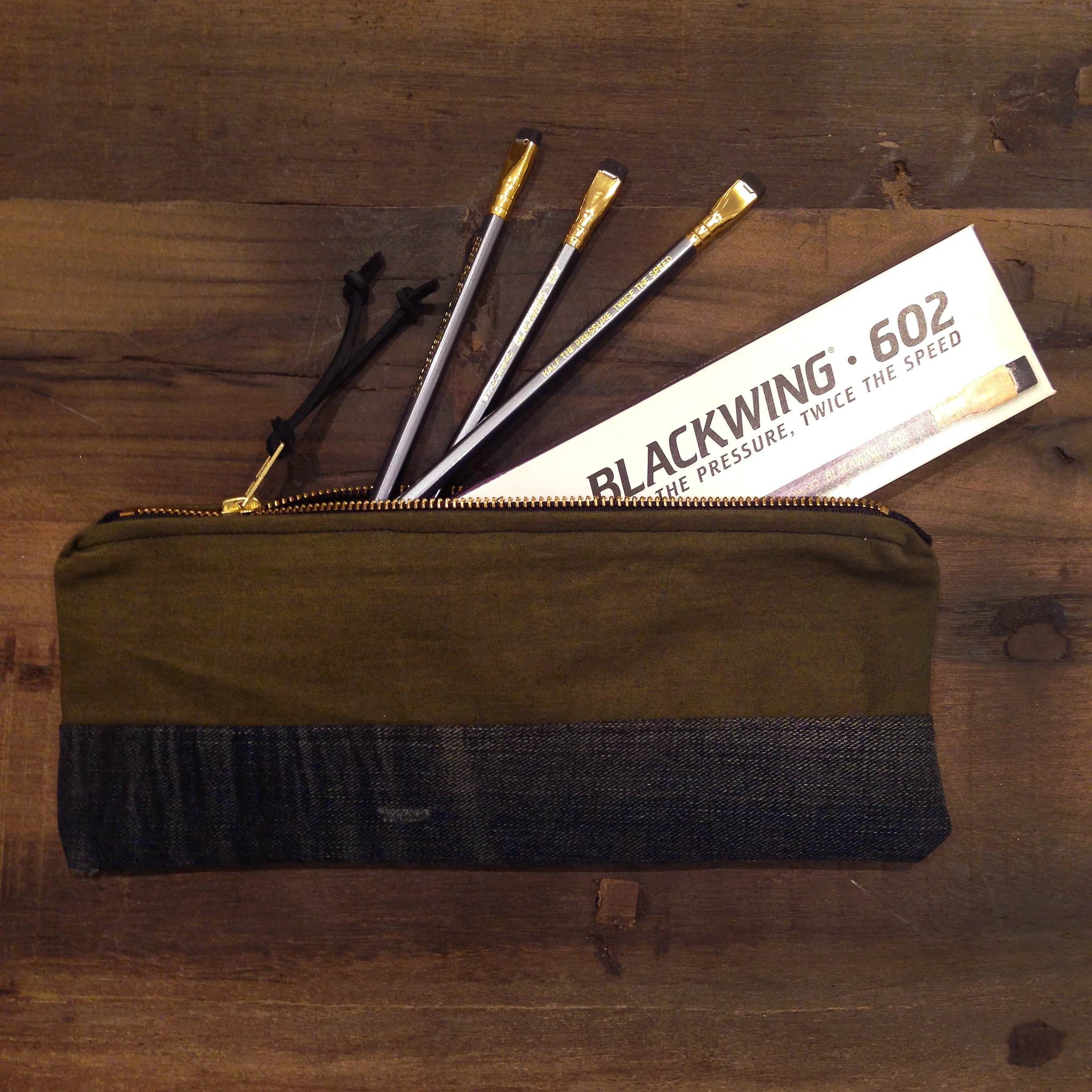 8. Blackwing 602 Pencils - Blackwing are the pencils Ernest Hemingway used to write his books. They have been used throughout history to create the most prized pieces of work. That's cool if you're into that sort of thing. It's the perfect gift for a writer, your boss or if your brother majored in Creative Writing... like someone I know. The pencils have flat erasers. If they write a pulitzer winning piece, you could take all the credit for giving them the tools they needed for success! 9. Den & Delve Pencil and Supply Case - Well you gotta put your flat pencils in something! Den & Delve takes vintage fabrics and repurposes them. This case was made from Army tents and dark denim. Each one is unique since they're all made my hand from old fabric. Another stocking stuffer I'm probably going to keep for myself.