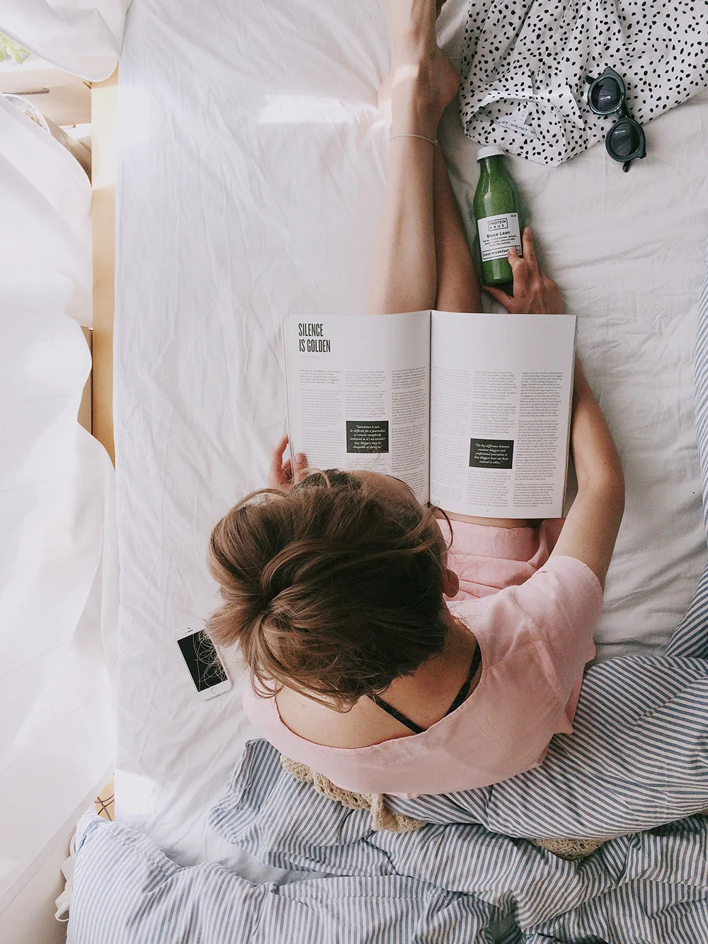 Woman-Reading-A-Book-In-Bed.jpg