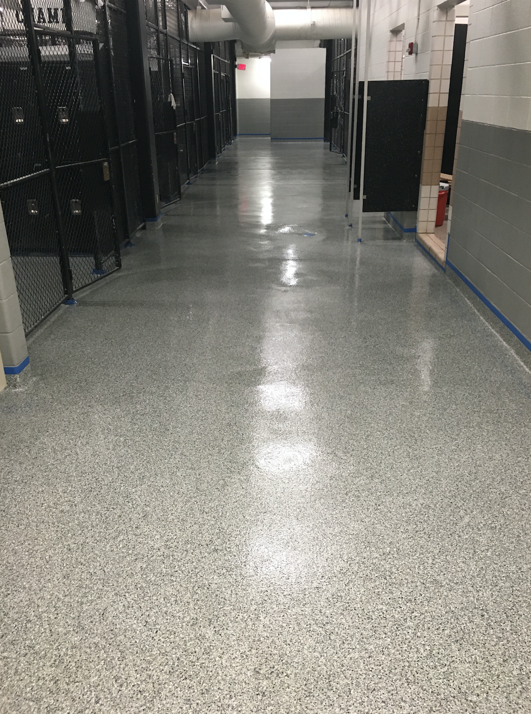 Beautiful Sikafloor locker room flooring installed by T.W. Hicks in San Antonio, Texas!