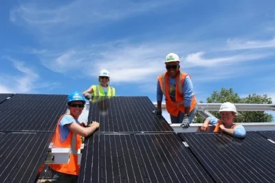 Volunteers at the Delta-Montrose Electric Association Project Install