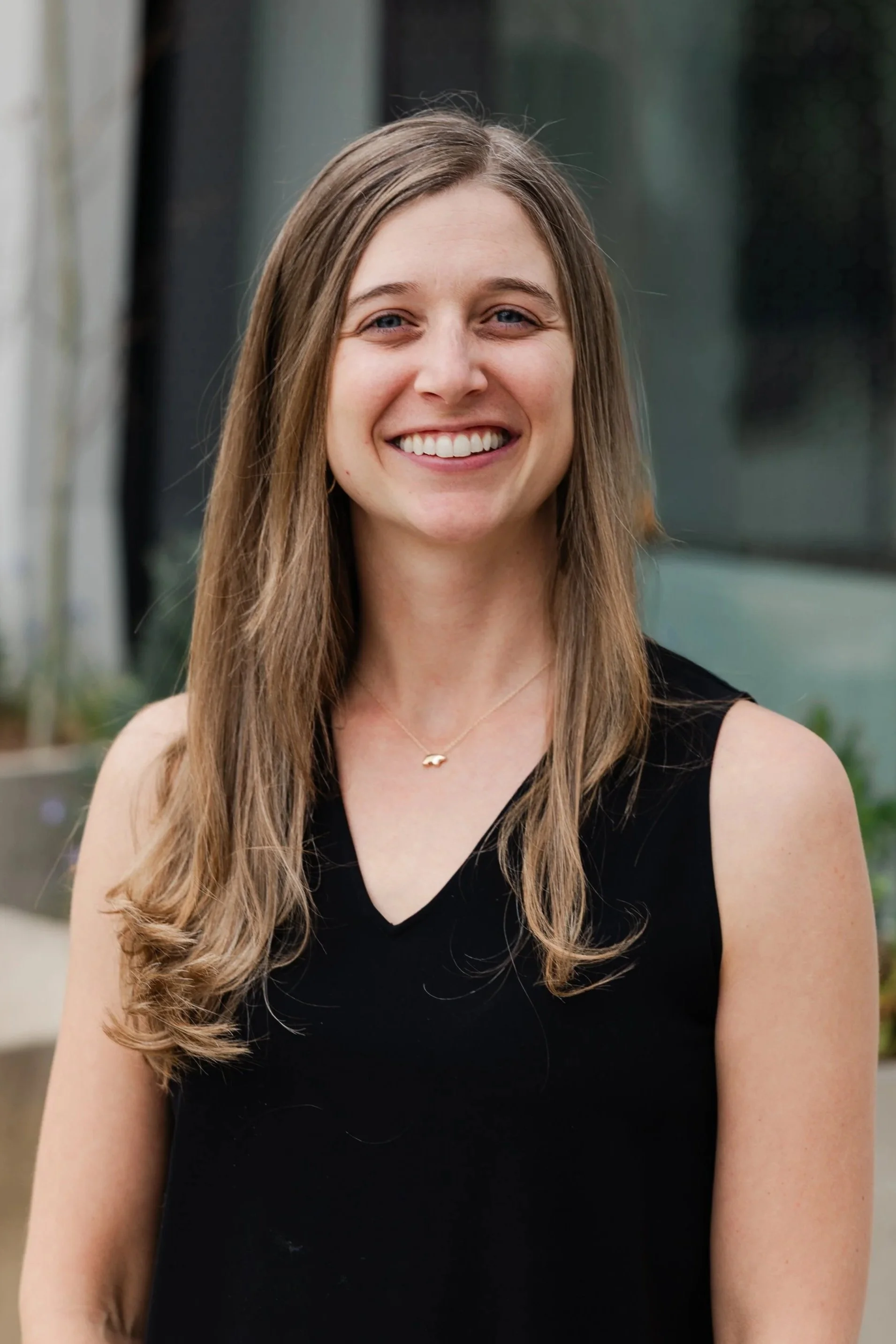 Headshot of Kim Schlaepfer.