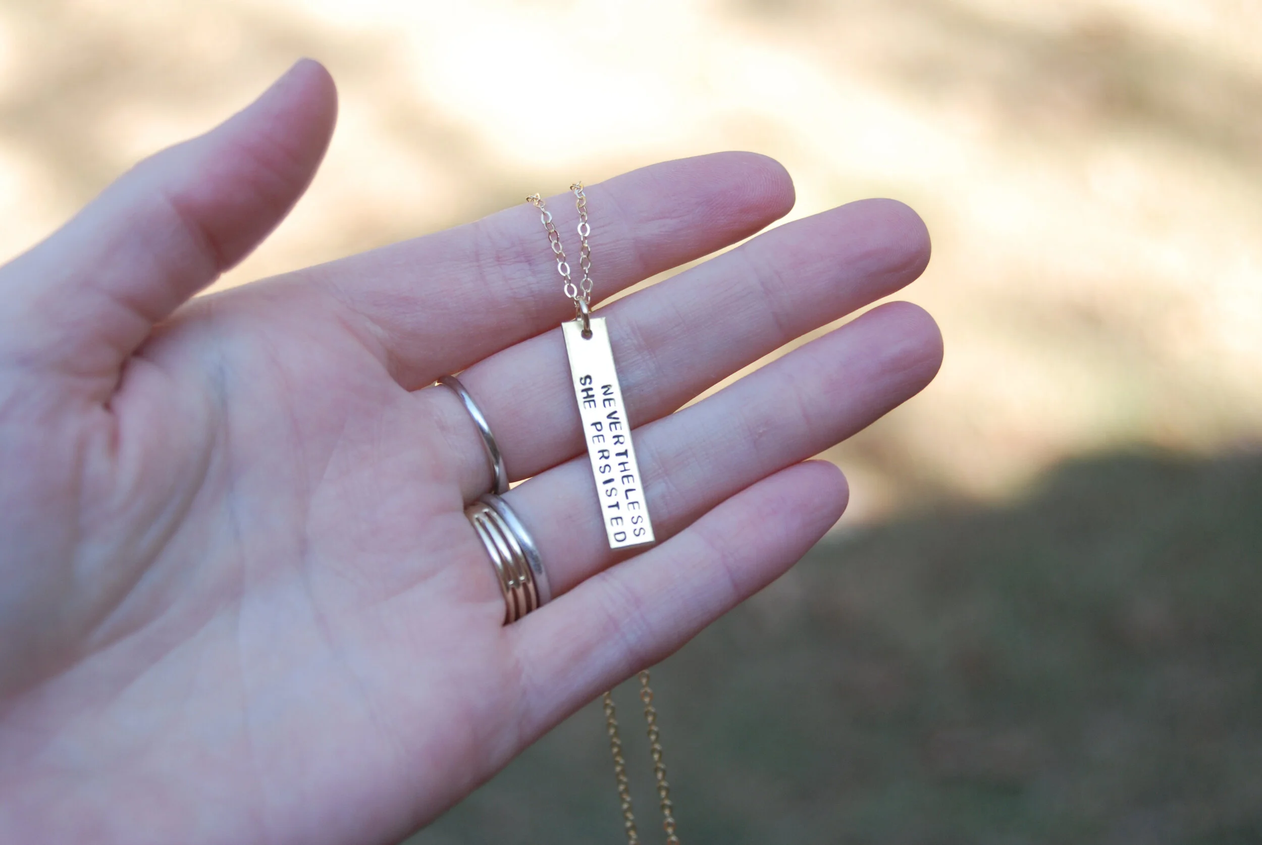 Nevertheless Vertical Brass 2.jpg