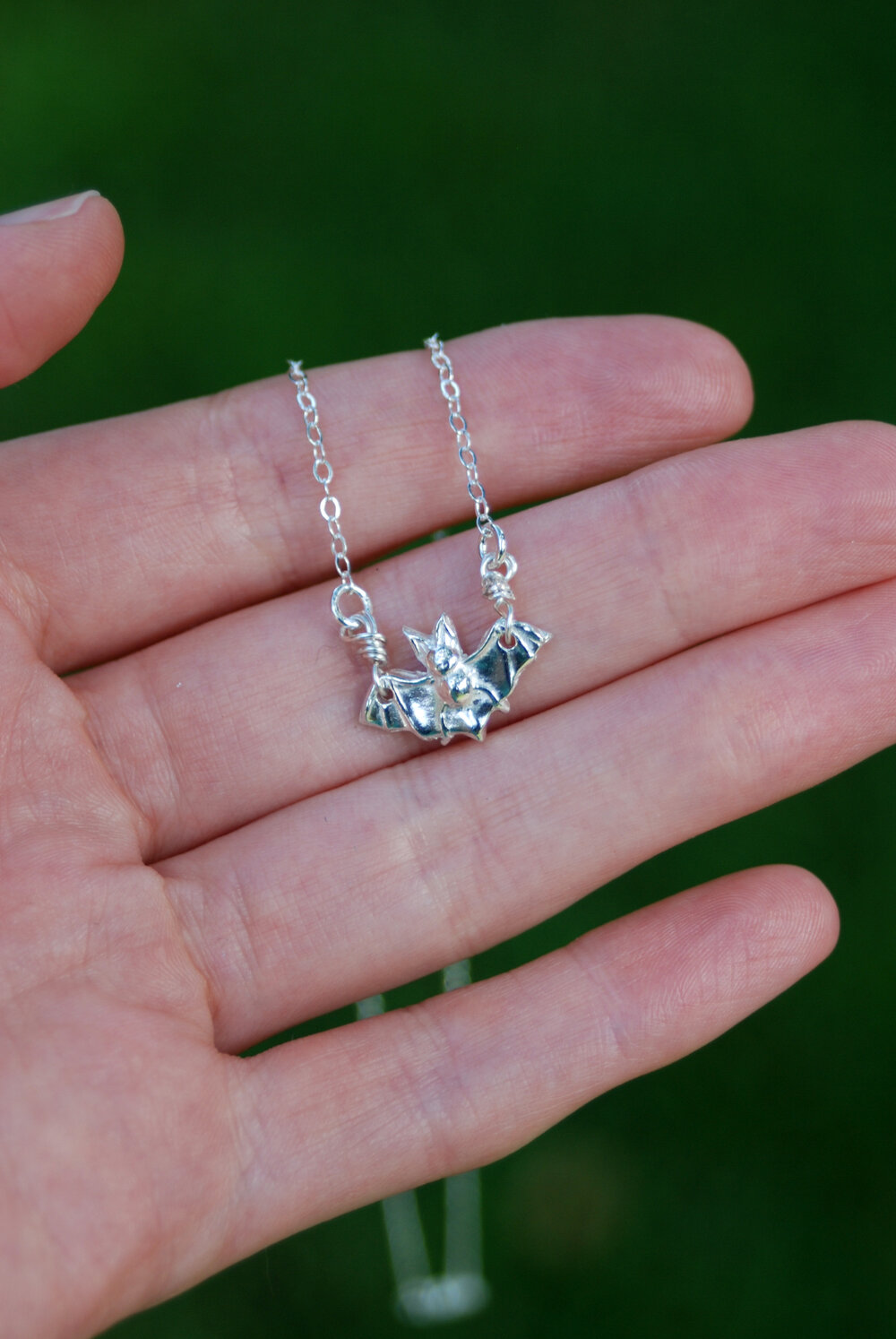 Tiny bat necklace in silver