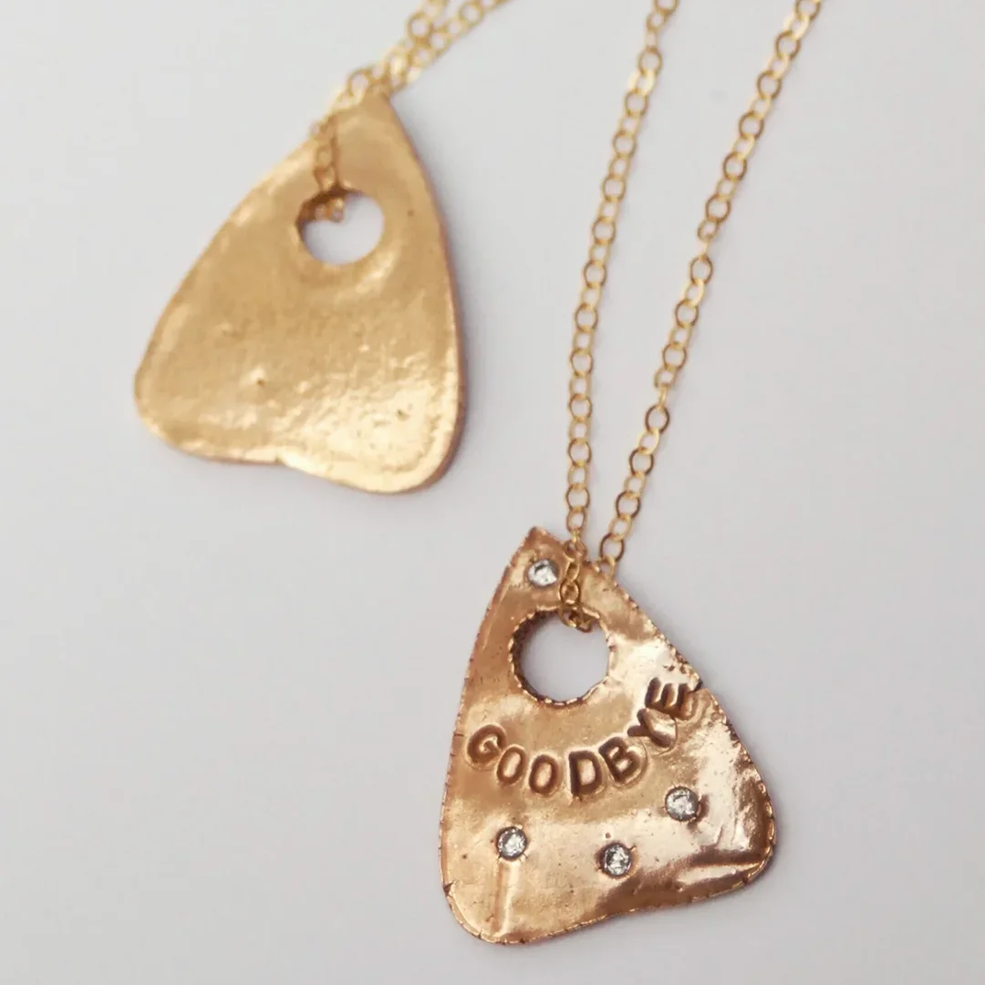Spooky-Planchette-Necklace-SQ.webp