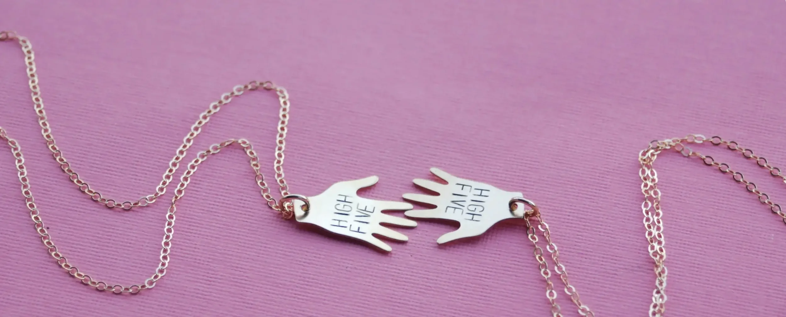 High Five hand-stamped necklaces