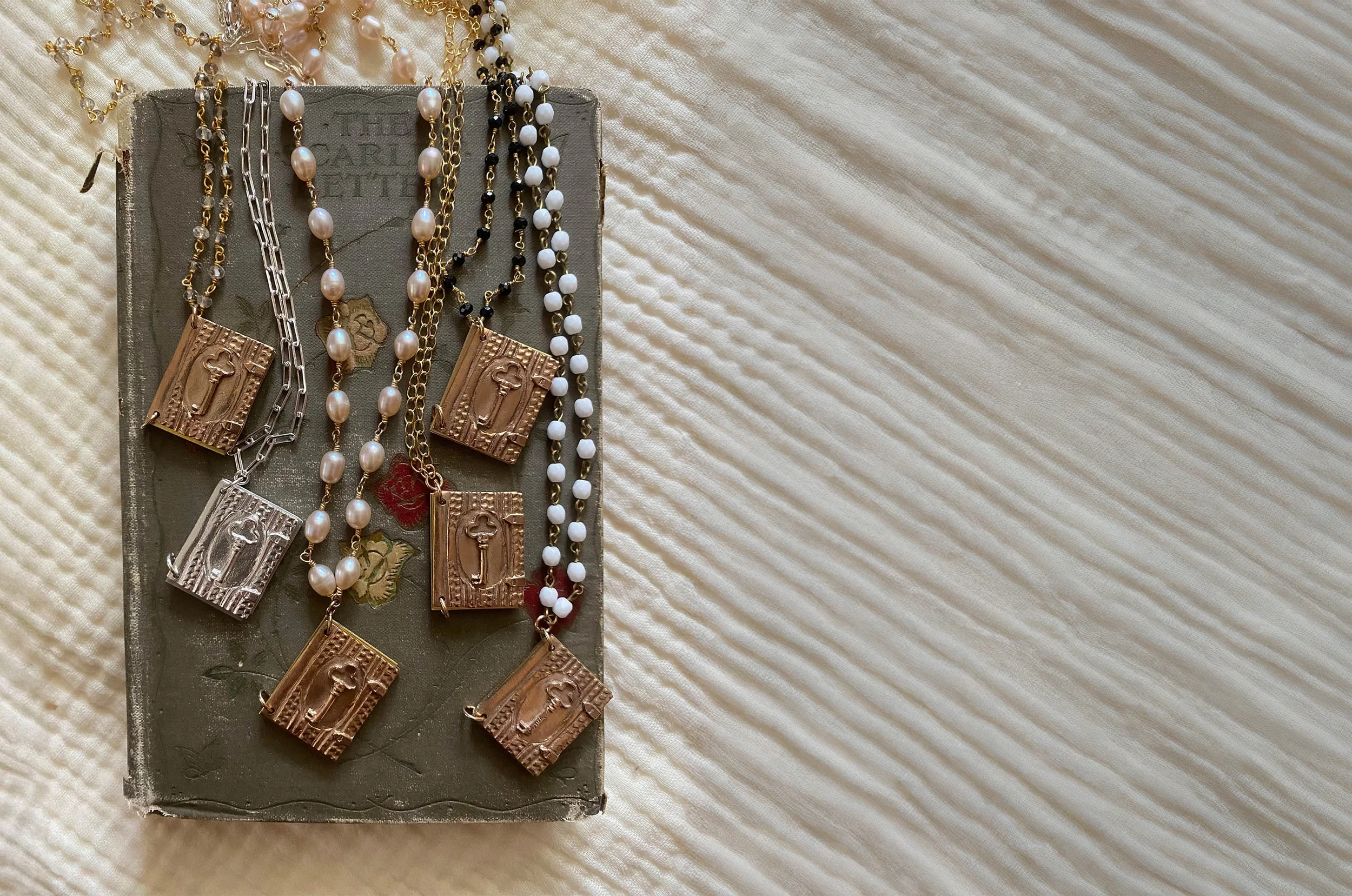 BuB-Books-Necklaces-Expanded-web-drk copy.webp