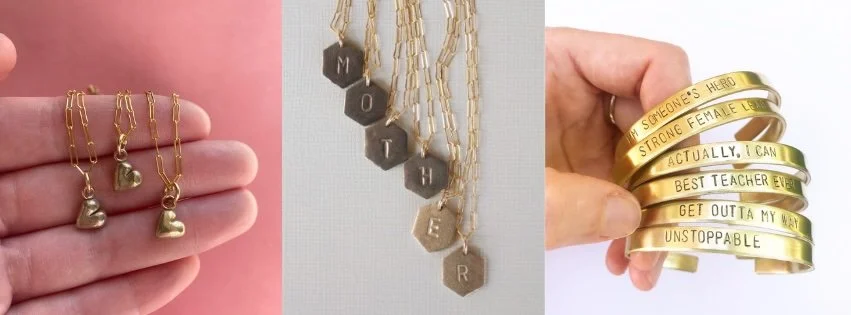 A tryprich image featuring a hand holding three gold puffy heart charmsm on chains, a row of gold haxagonal mmonogram pendants that spell out "mother" and a hand holding a group of custom stamped cuffs