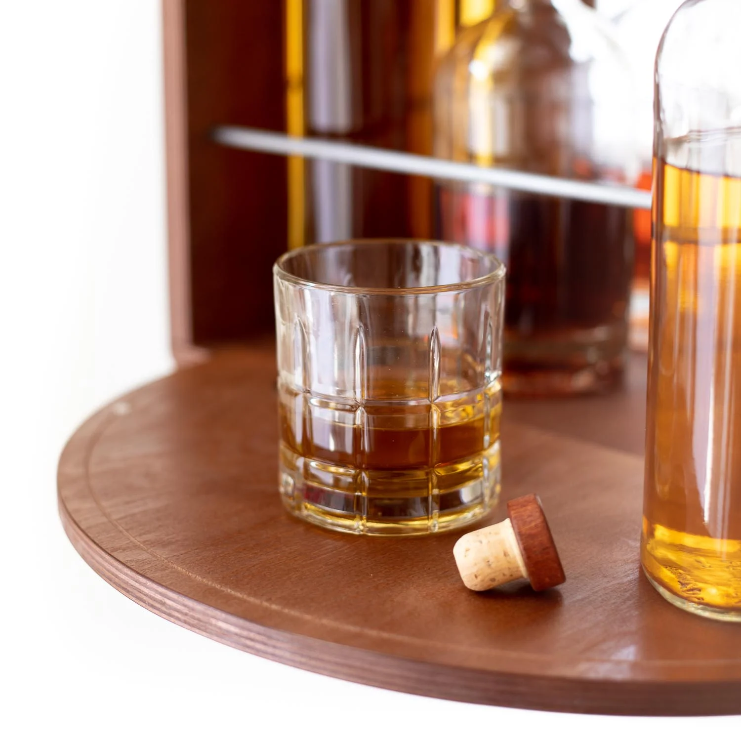 Whiskey cabinet with flip-down serving tray
