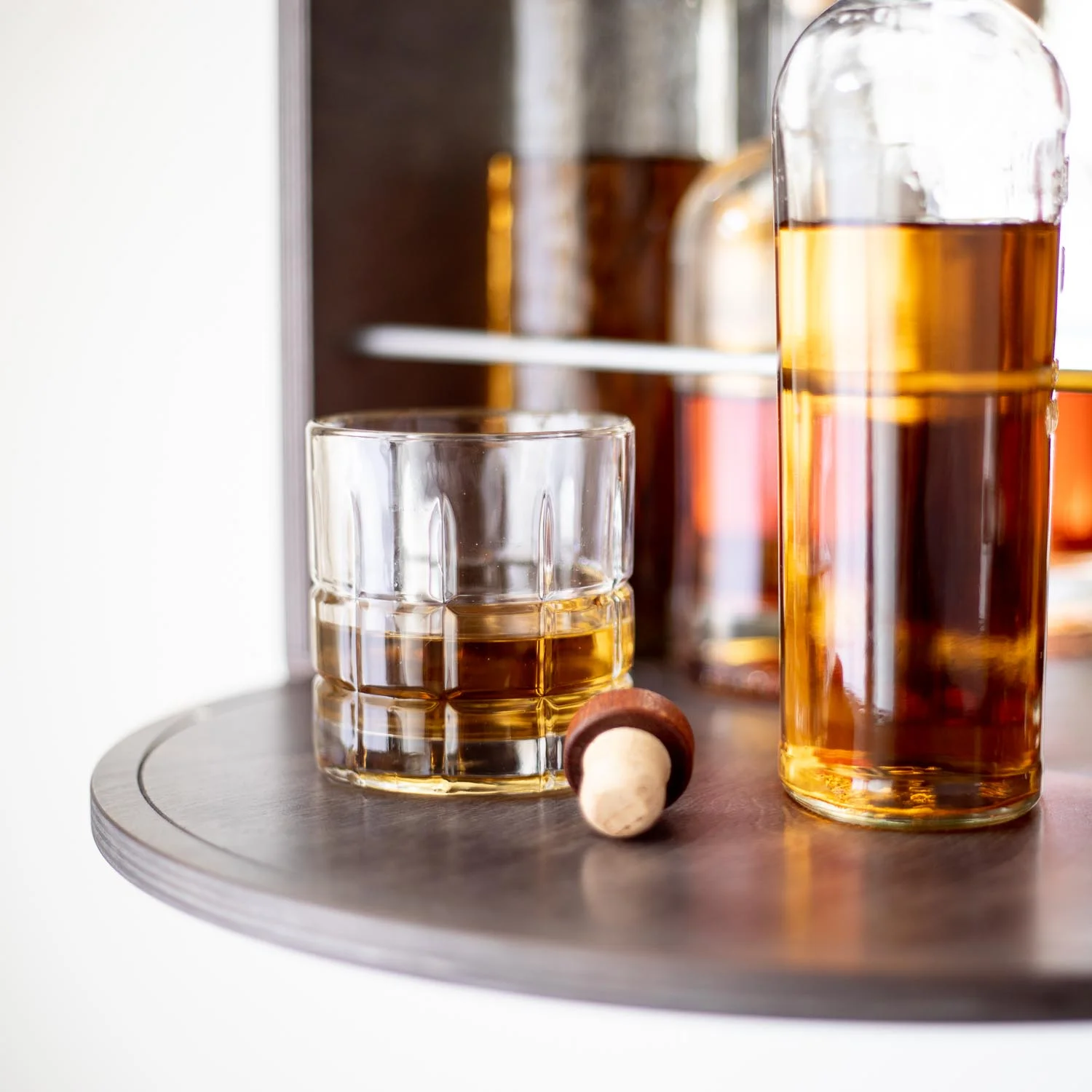 Liquor bar with fold-down drink prep tray