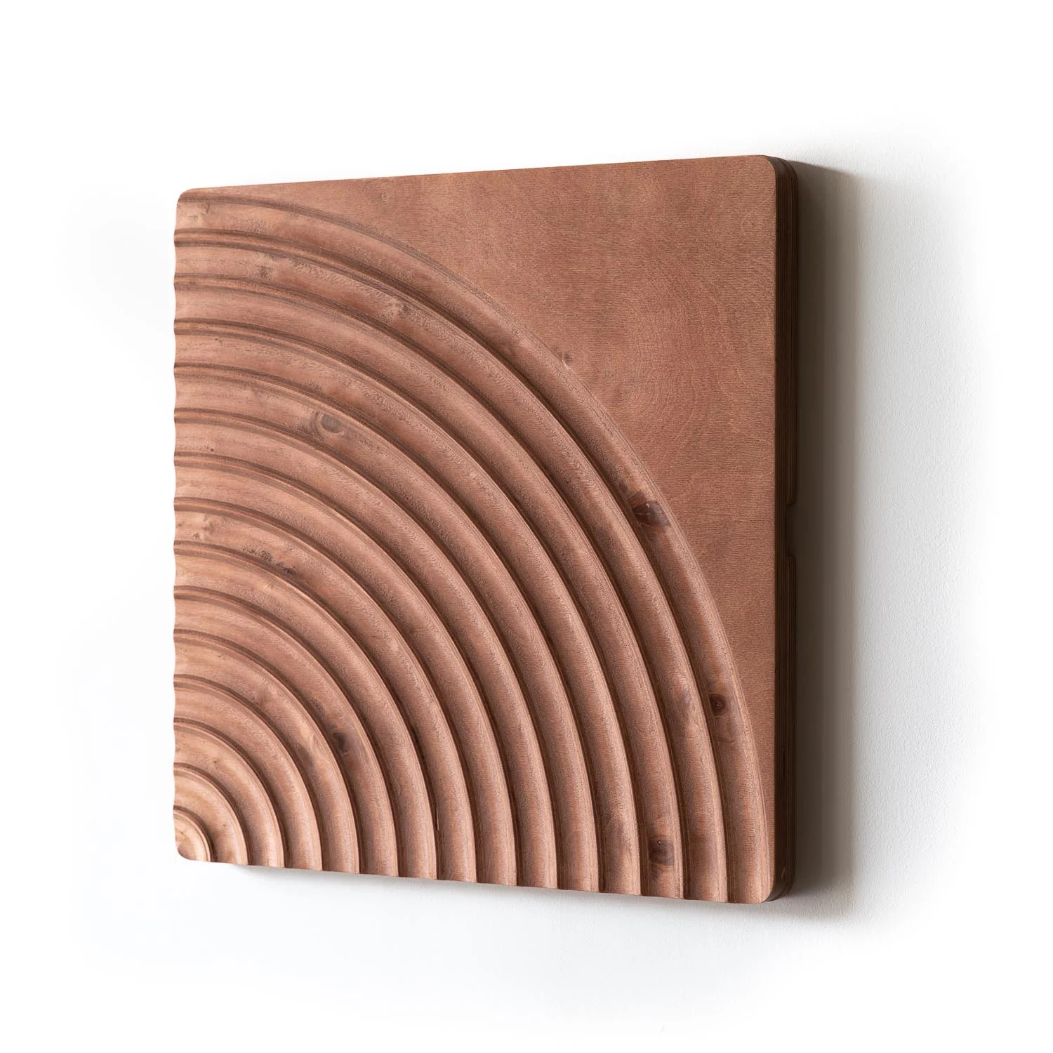 Wood-carved wall panel featuring a channel bend motif by KARVD