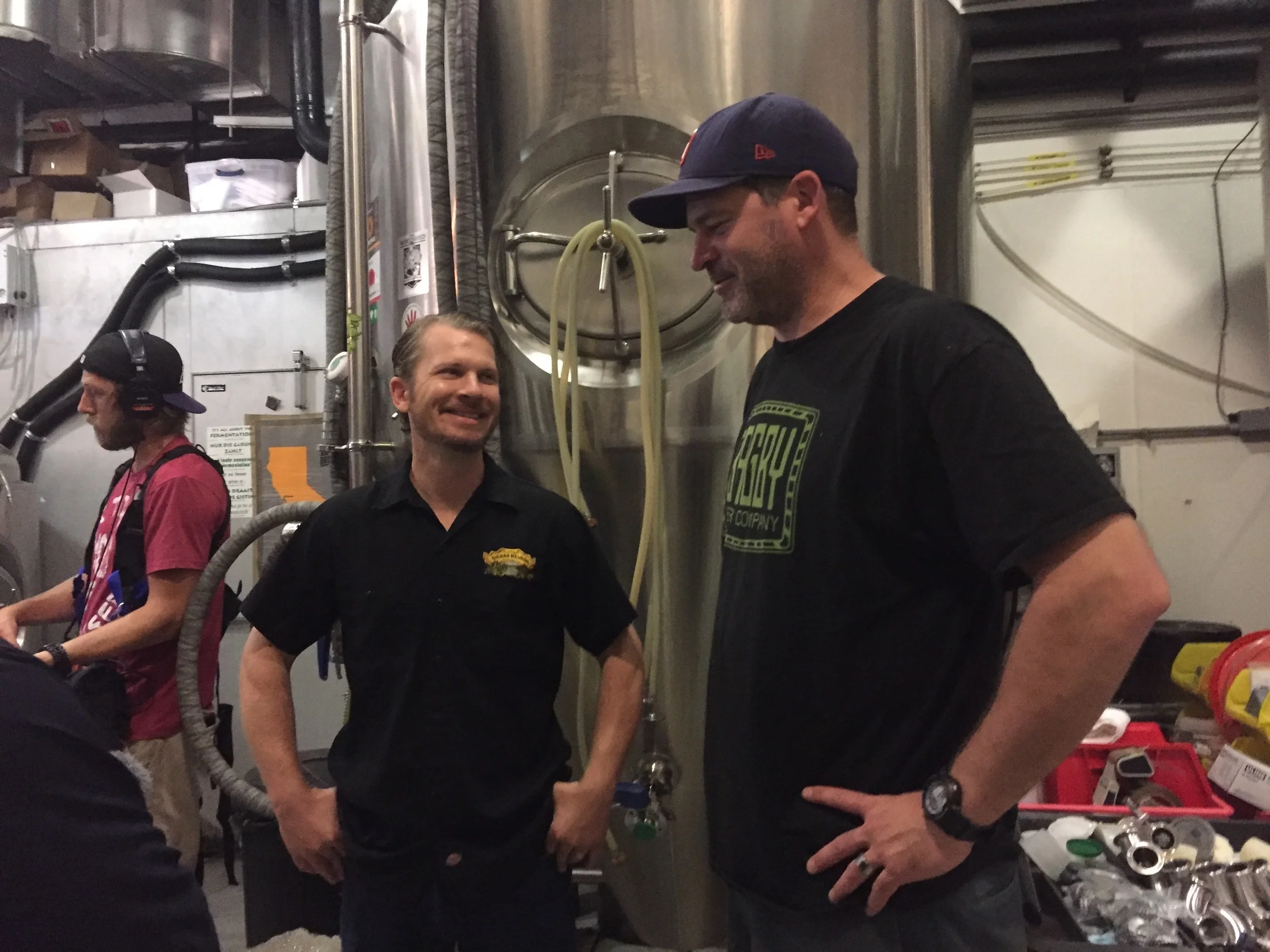 Jeff and Sierra Nevada brewer Isaiah Mangold chatting during the test brew for the Southwest Group's American Stout at Beachwood Long Beach - check out the sound guy in the background!