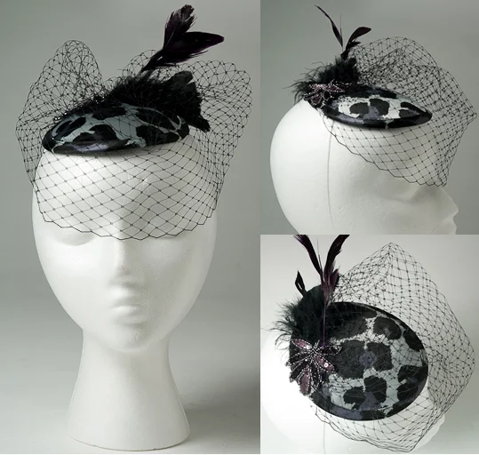 black cheetah fascinator.jpg