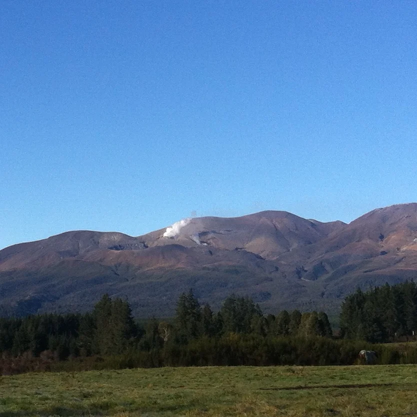 From the road, you can see the crater and steam coming from the volcano.