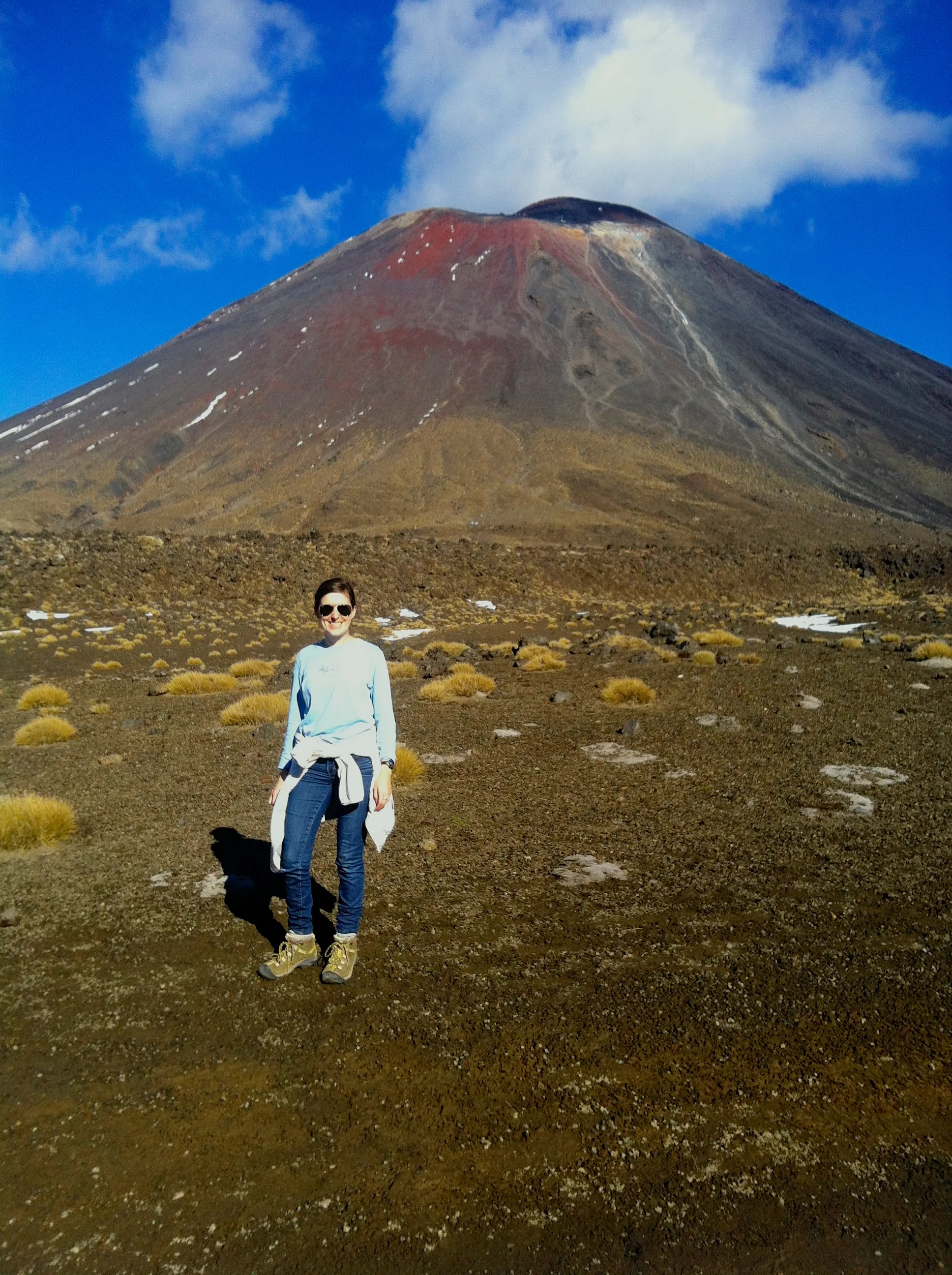 Standing in the south crater during our 8 hour hike across active volcanoes on the Tongariro Crossing.