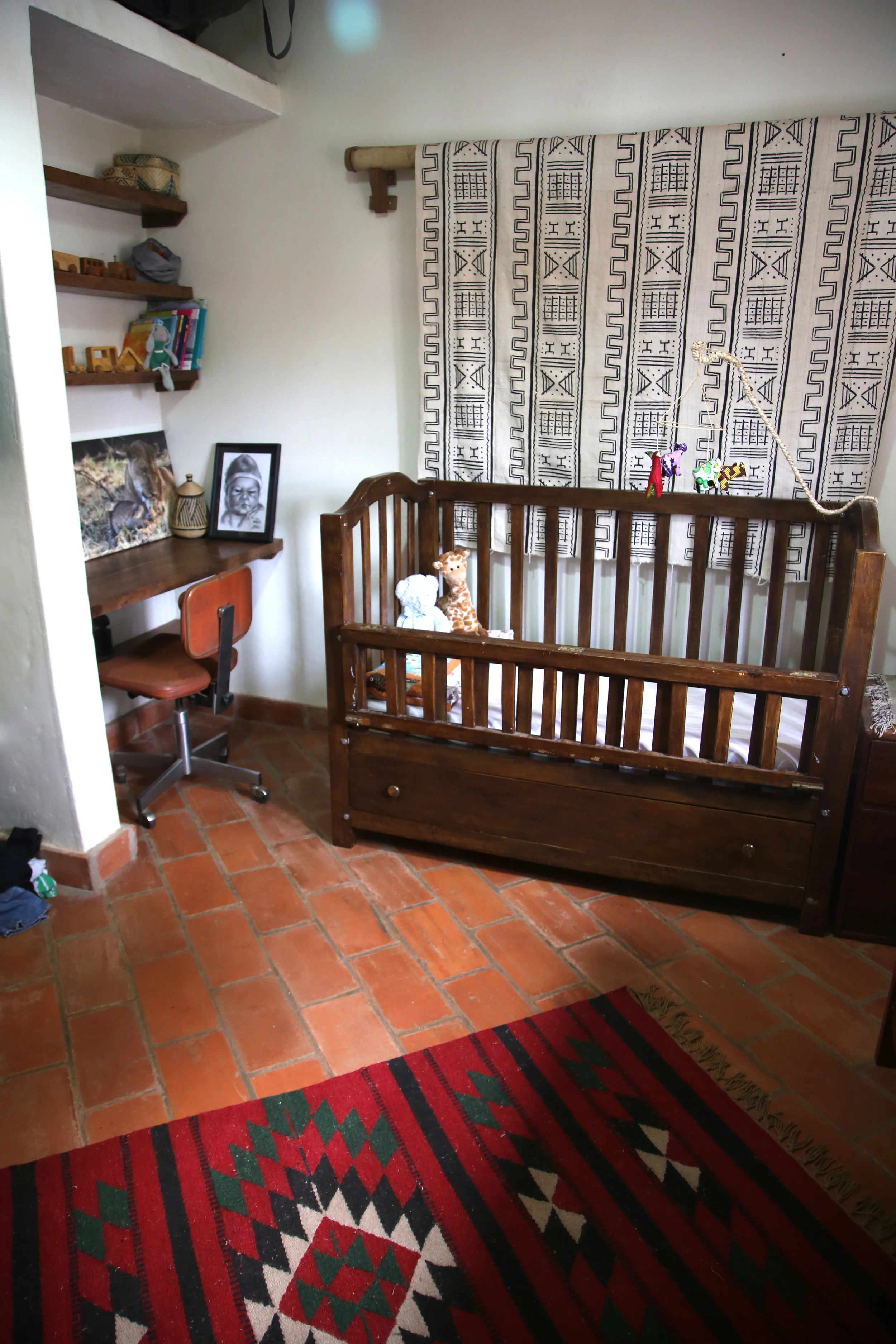 Mudcloth wall hanging imported from West Africa by Mazmoon's Treasures .
