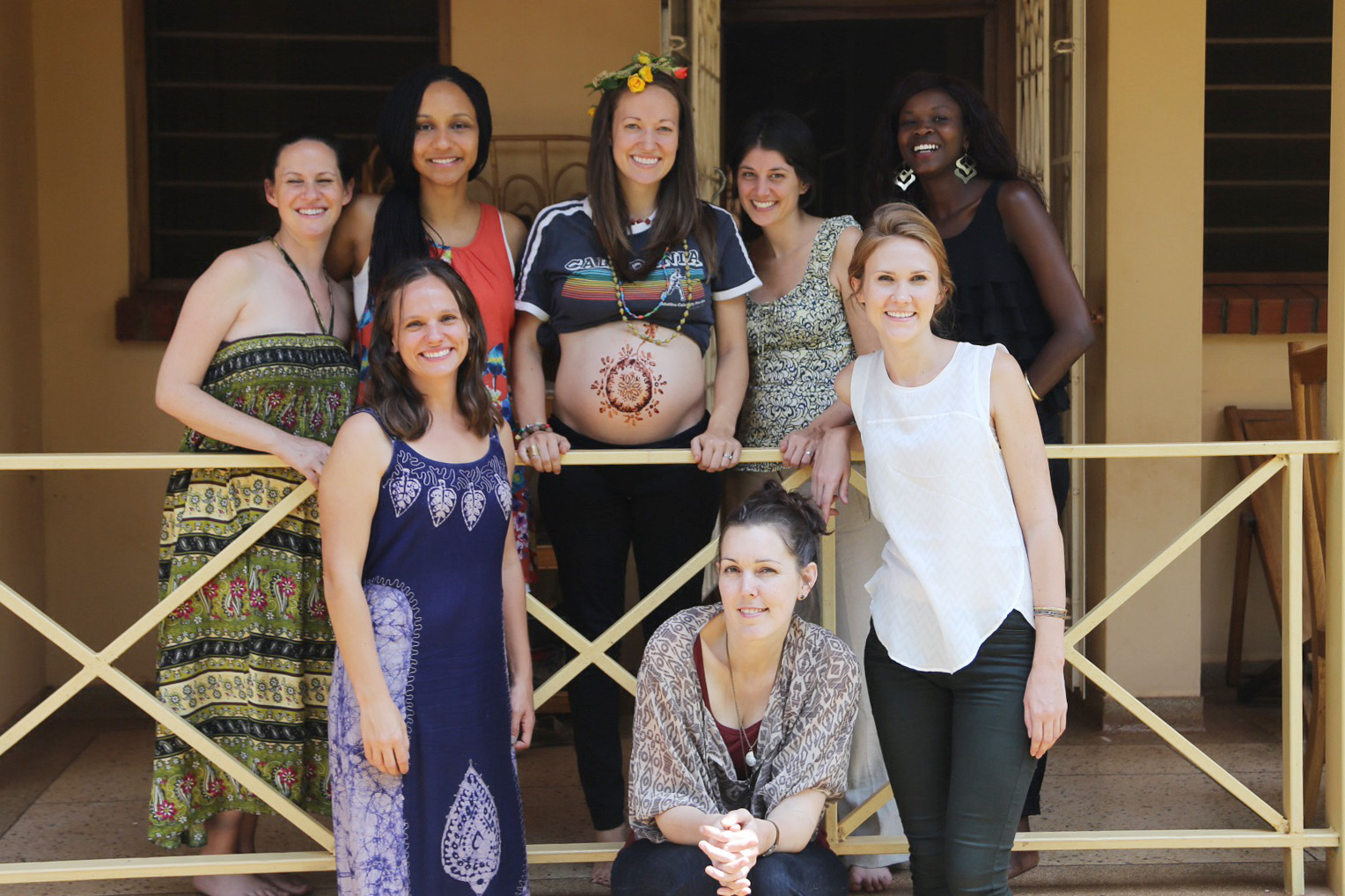 Here I am at my blessingway, surrounded by very special women and feeling more than blessed. I do, however, acknowledge that I look more hippie than ever with my flower crown, labor beads around my neck, henna belly tattoo, and rainbow California shirt! Ha!