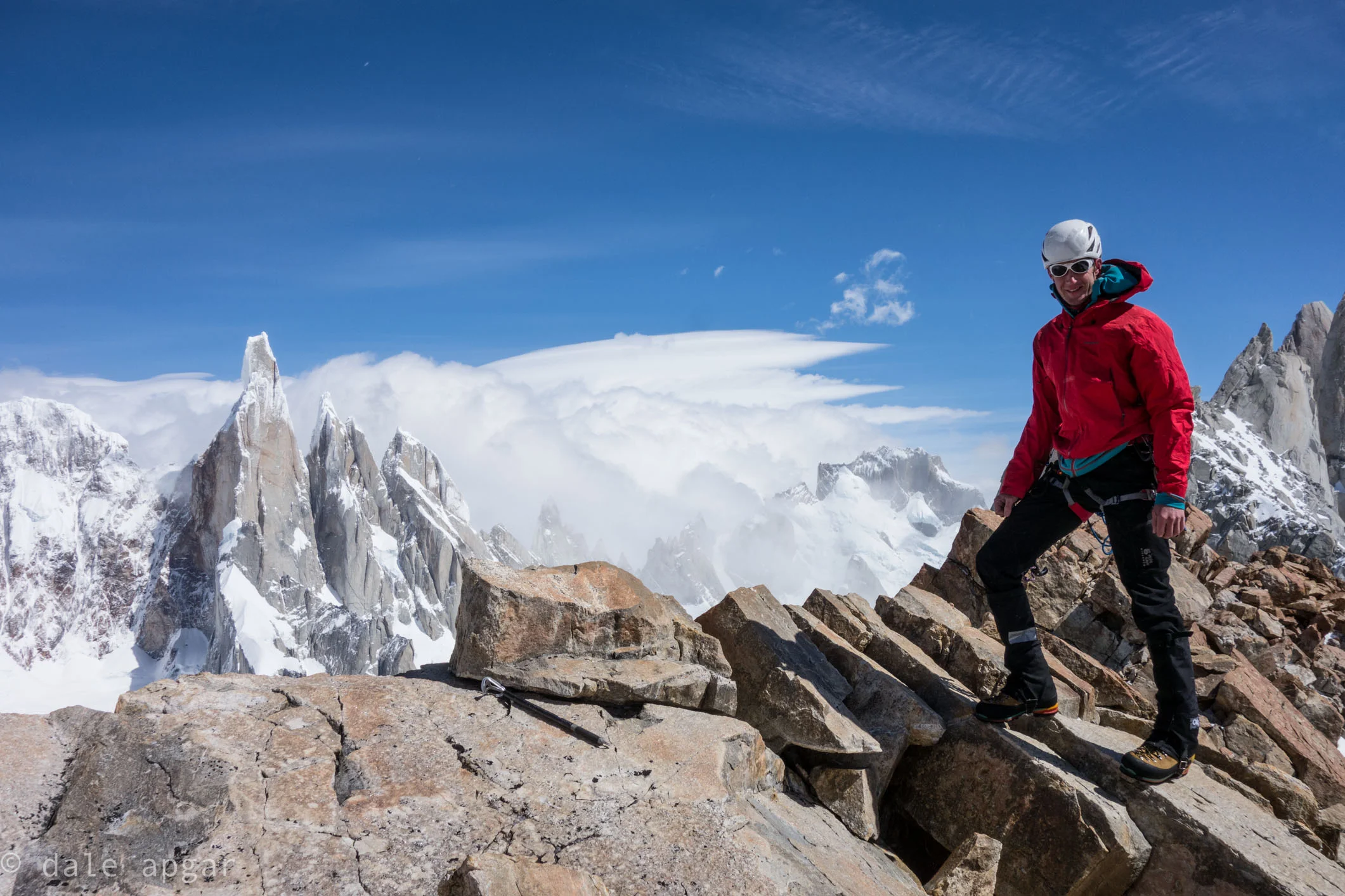 Jeff gets his first cumbre of the trip and gets a glimpse of the weather pouring over the Torre Massif