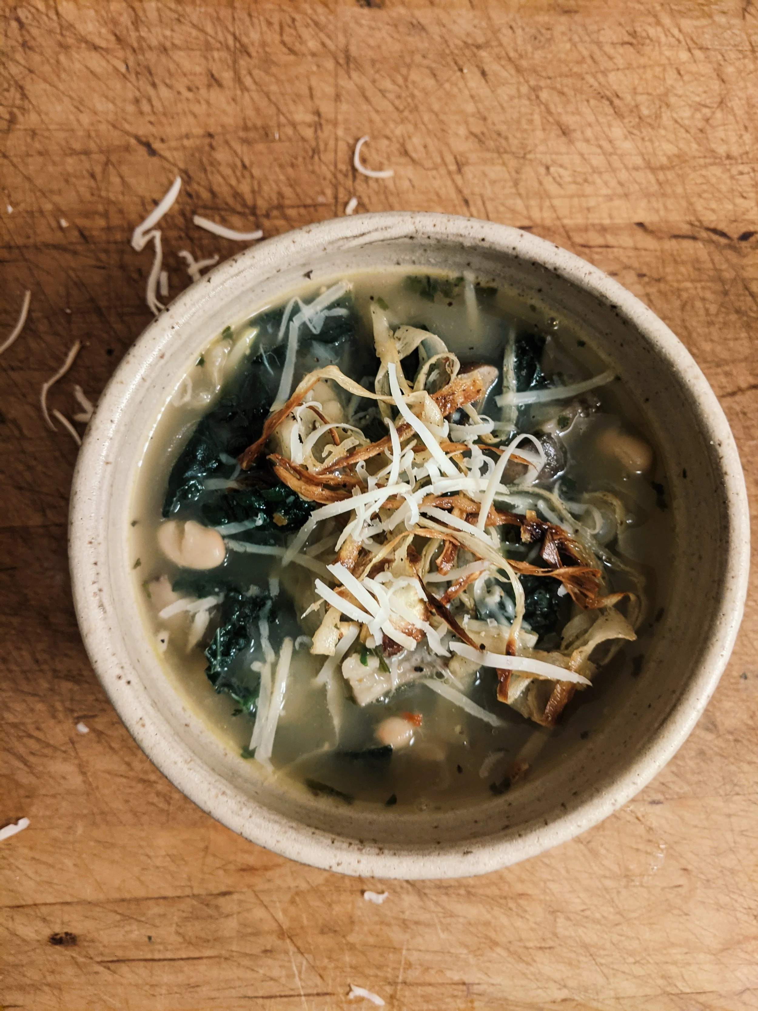 WHITE BEAN + KALE SOUP WITH PARSNIP CRISPS