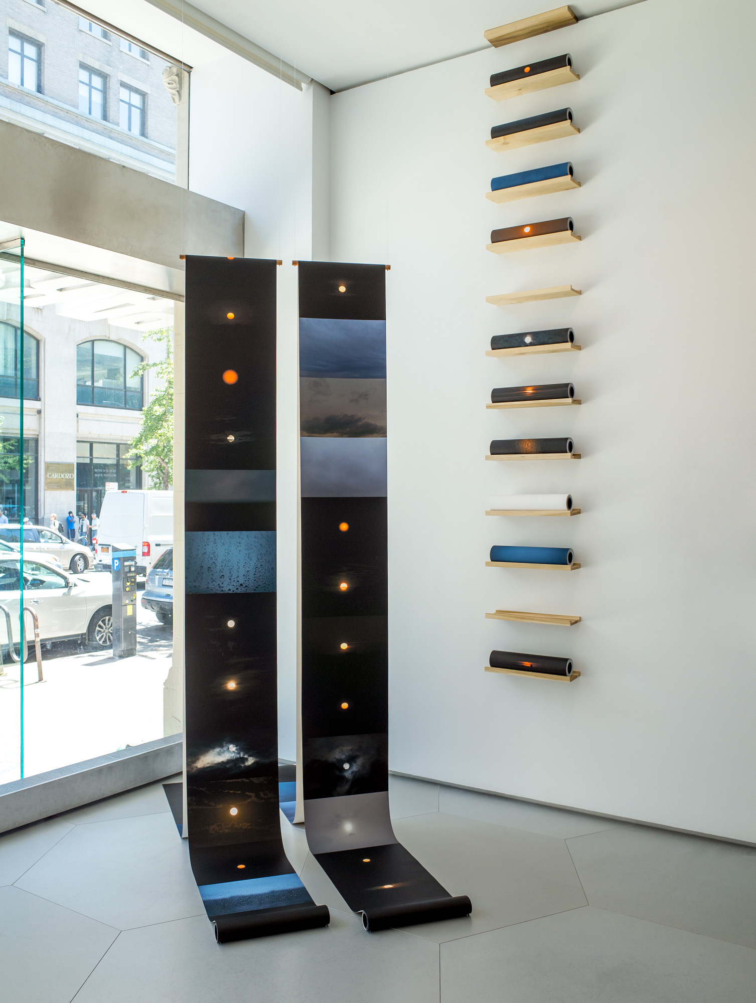 Archival pigment print on 17” canvas rolls, wood, strings and time, installation dimensions variable