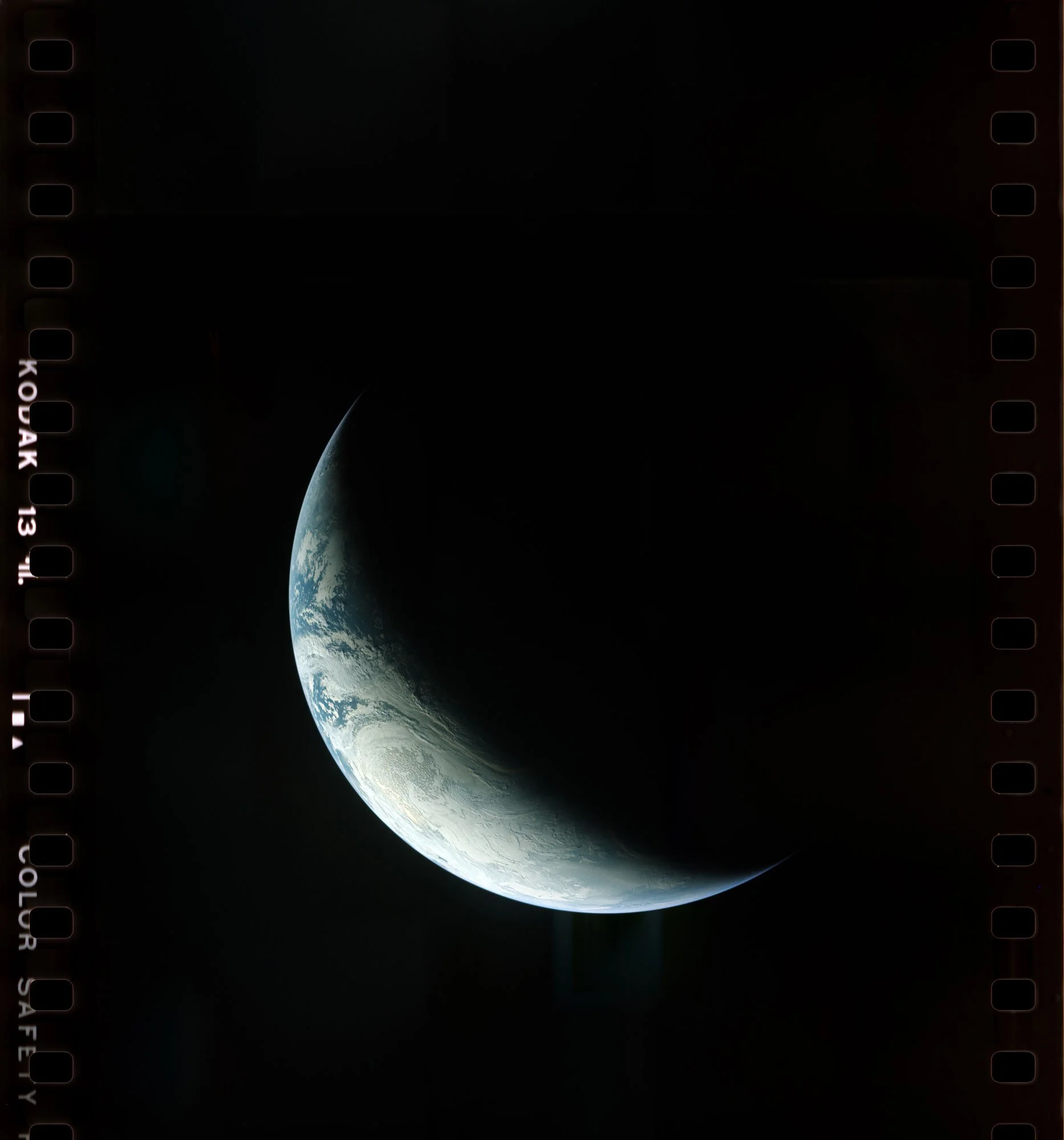 Apollo 4 — Earth View November 9, 1967 During the uncrewed first flight of the Saturn V rocket, Apollo 4’s automated camera captured this photograph from more than 11,000 miles away. The image shows a cloud-covered Earth framed against the bl