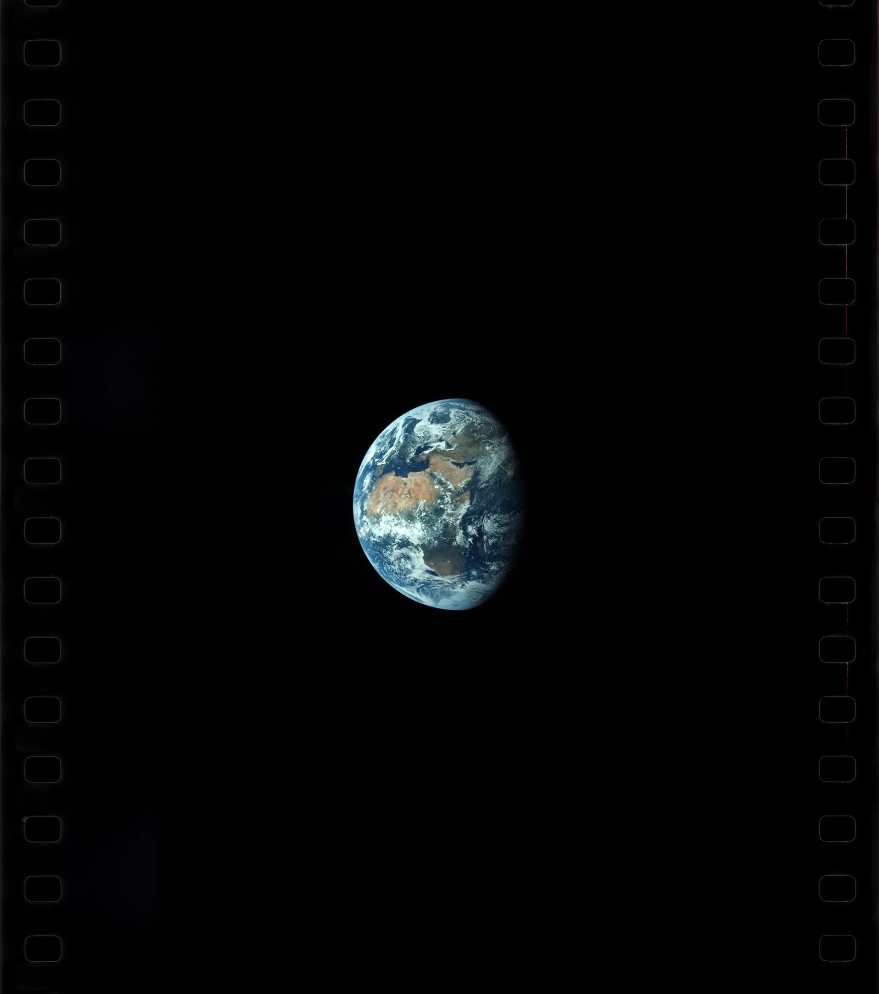 Apollo 11 — Earth View July 16, 1969 Shortly after Apollo 11 began its journey to the Moon, the crew captured this photograph from about 181,000 kilometers away. The nearly full Earth fills the frame, with Africa at the center, Europe and wes