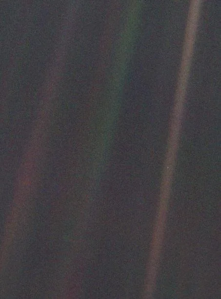 Voyager 1 — Pale Blue Dot February 14, 1990 Taken by NASA’s Voyager 1 spacecraft from a distance of about 3.7 billion miles (6 billion kilometers), on the outer edge of our solar system, this image shows Earth as a tiny speck, less than a sing