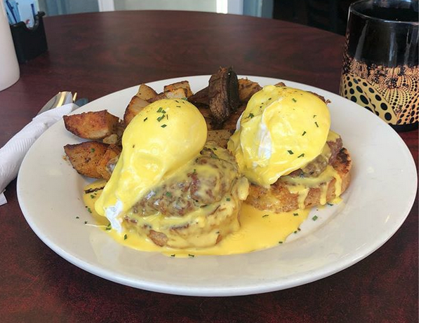 Hogs In A ‘Daise - Homemade pork sausage Benedict served on biscuits