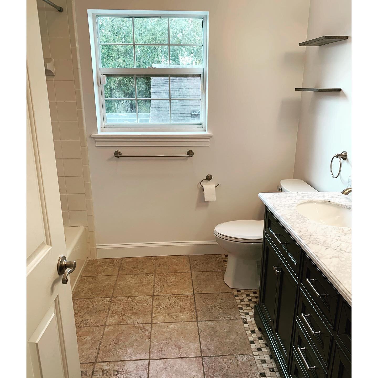 Partial Bathroom Upgrade.  Removal of dark outdated wall paper .  Removal of knee was to extend vanity to 5 ft. Skim coat walls and finish with #benjaminmoore kitchen &amp; bath paint. By tiling the floor area below vanity and toilet we were able to 