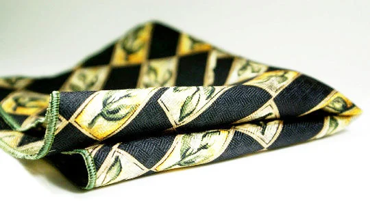  Textured silk pocket square with timeless design of floral bud in black and green.