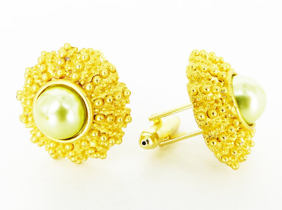 Handcrafted Women's cufflinks in both of our stores. Mint pearl Sea Urchins set in gold.