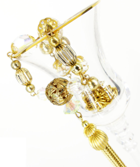 Estate finds, tassels, chime balls, crystals and pearls. Classic & timeless elegance.